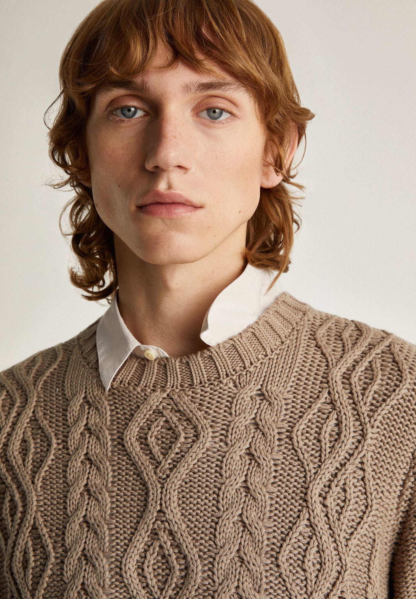 SWEATER WITH CABLE-KNIT DETAILS