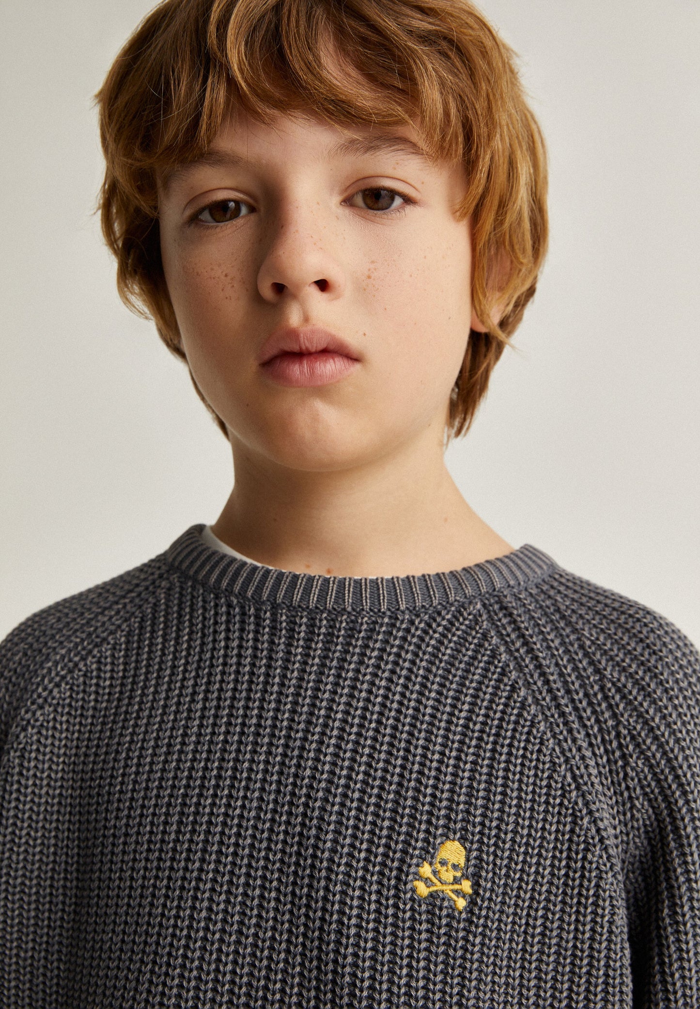 FADED SWEATER WITH CONTRAST SKULL