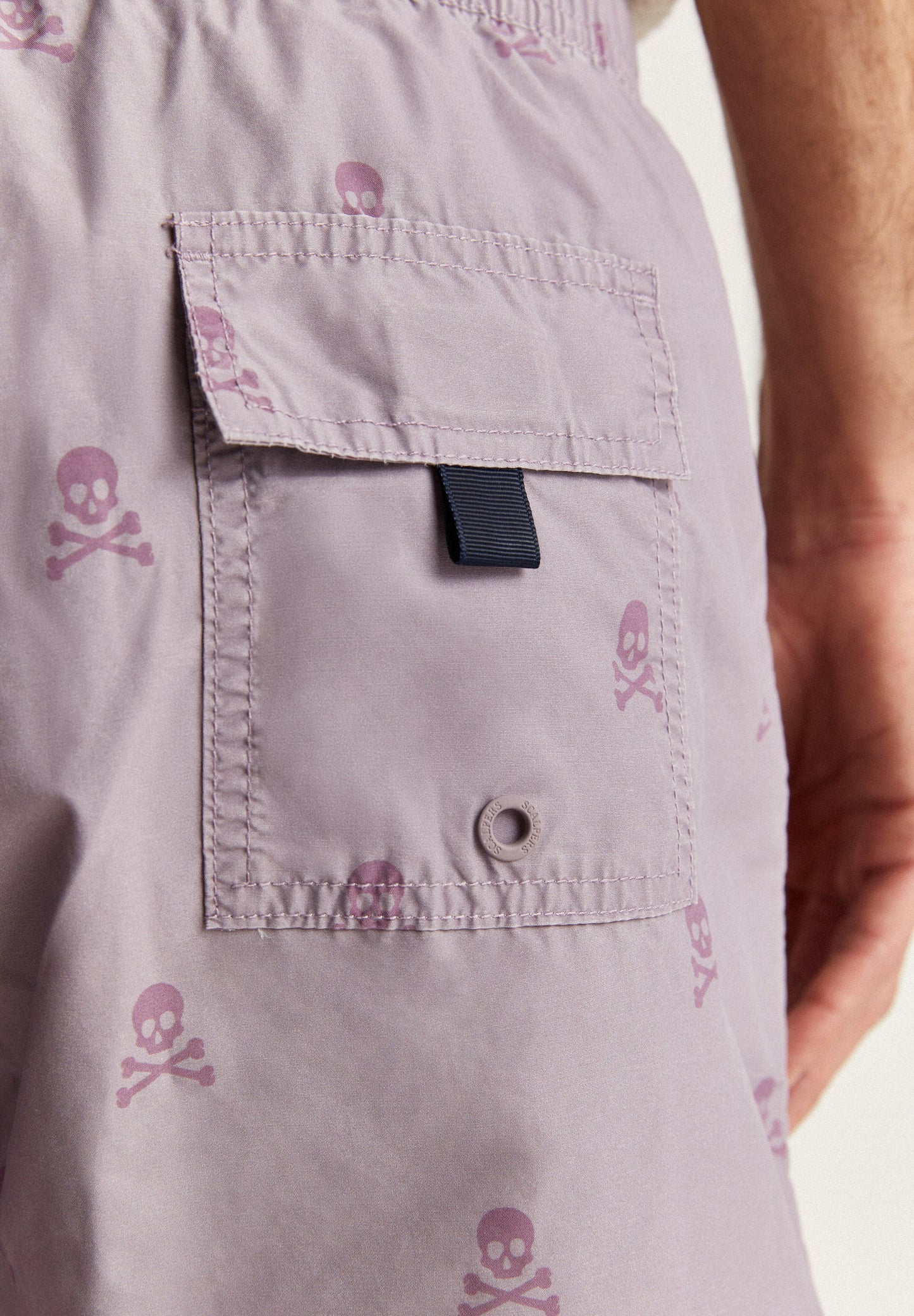 SWIMMING TRUNKS WITH ALL-OVER SKULLS