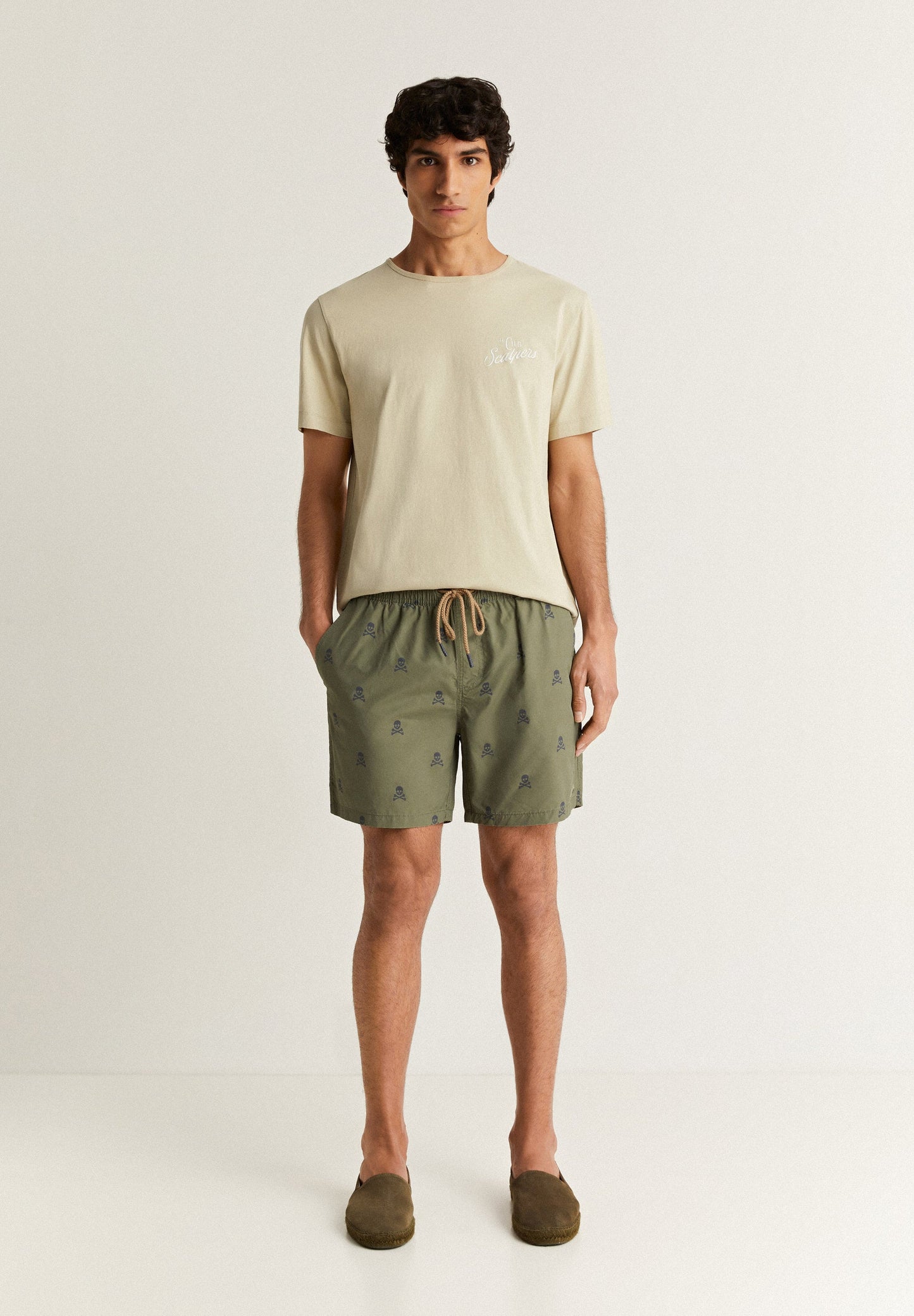 SWIMMING TRUNKS WITH ALL-OVER SKULLS
