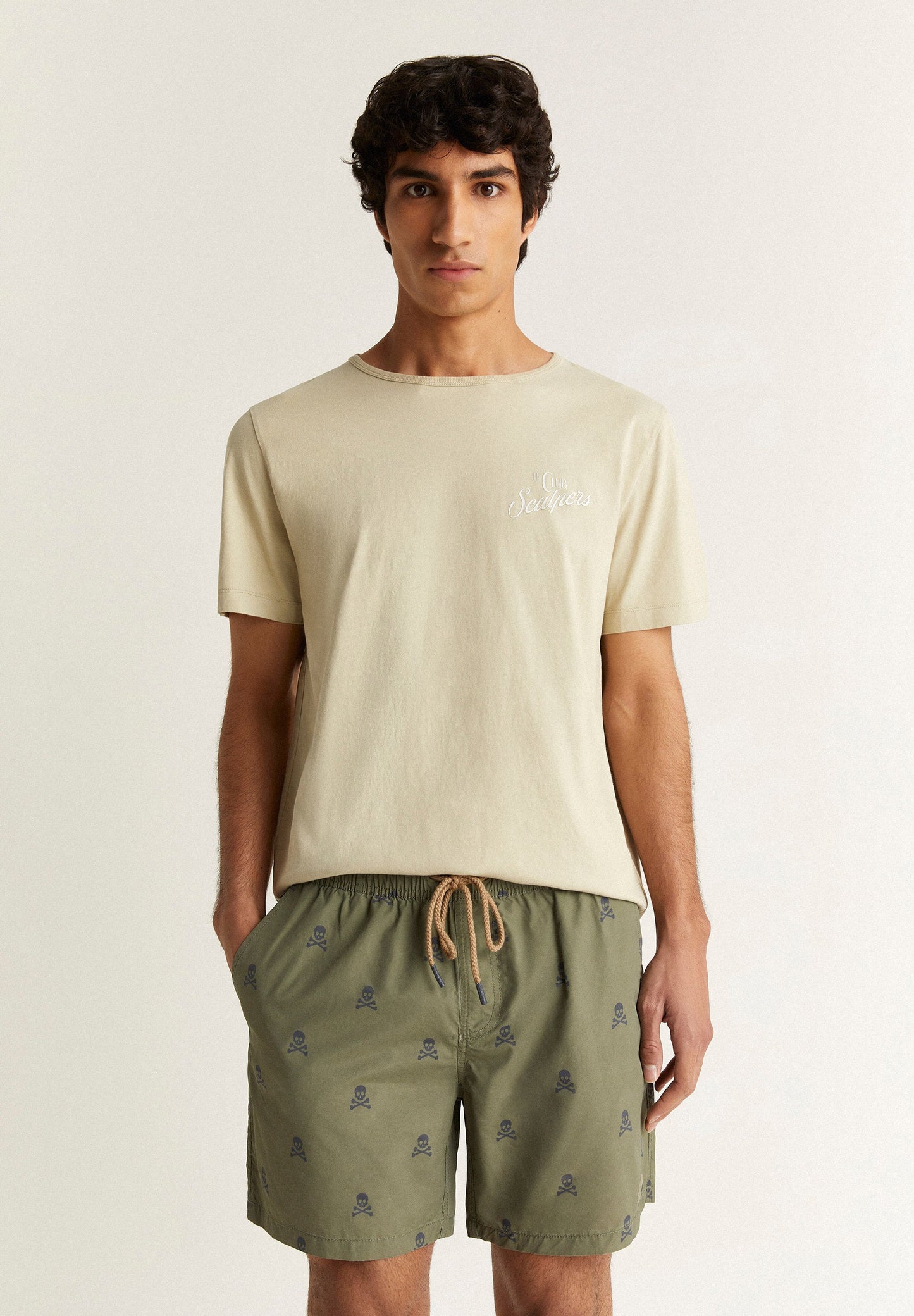 SWIMMING TRUNKS WITH ALL-OVER SKULLS