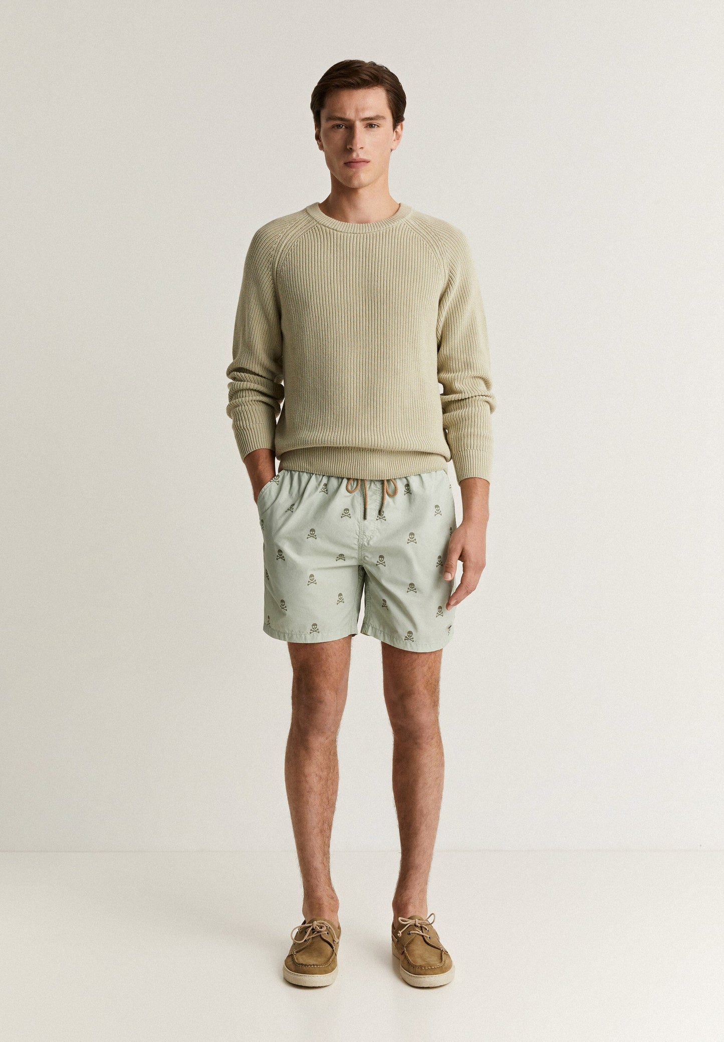 SWIMMING TRUNKS WITH ALL-OVER SKULLS