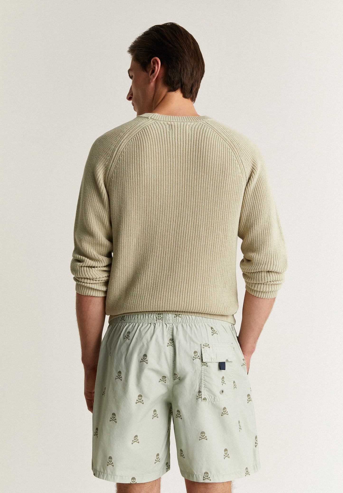 SWIMMING TRUNKS WITH ALL-OVER SKULLS