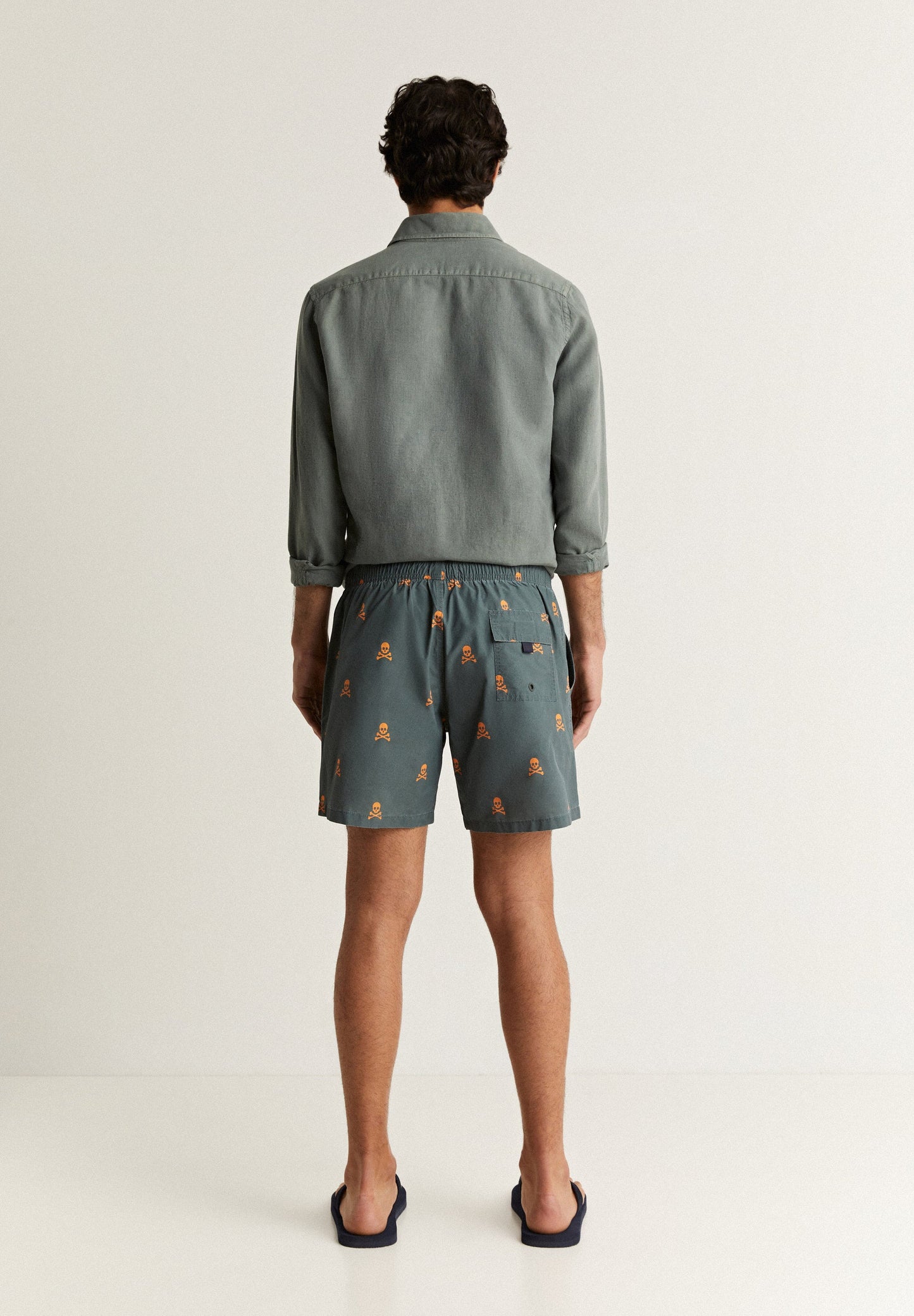 SWIMMING TRUNKS WITH ALL-OVER NEON SKULLS