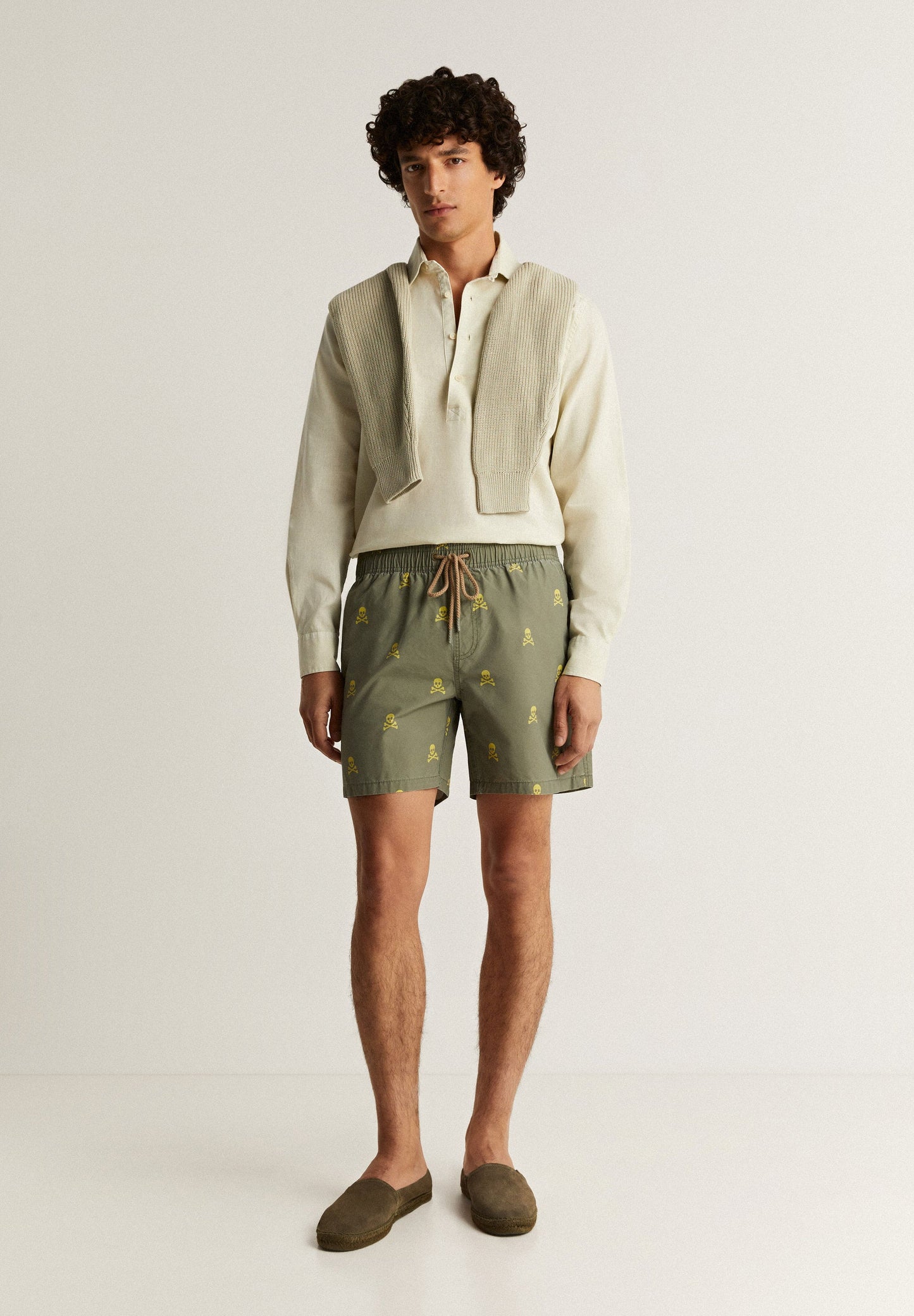 SWIMMING TRUNKS WITH ALL-OVER NEON SKULLS