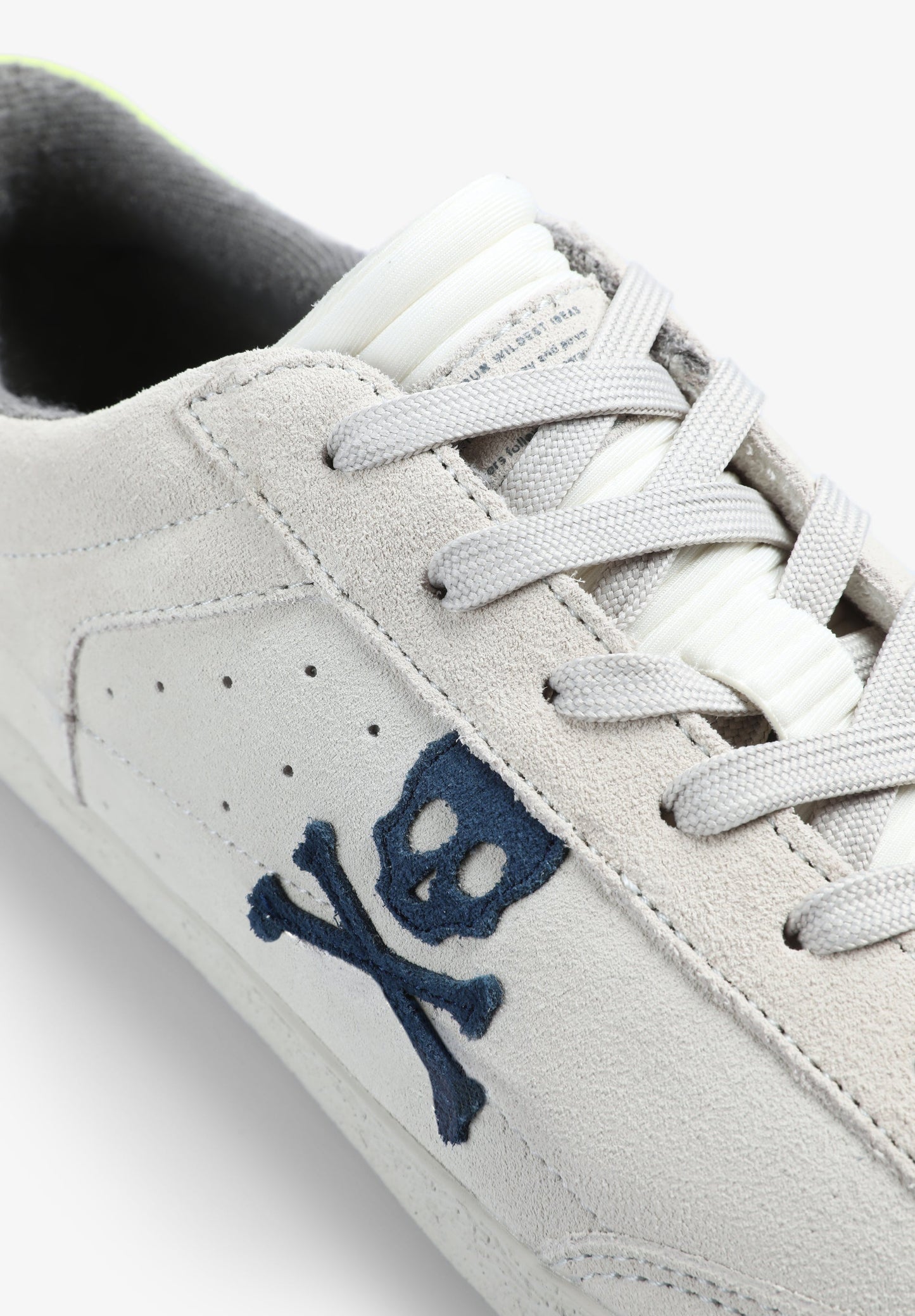 LOW TOP SNEAKERS WITH SIDE SKULL