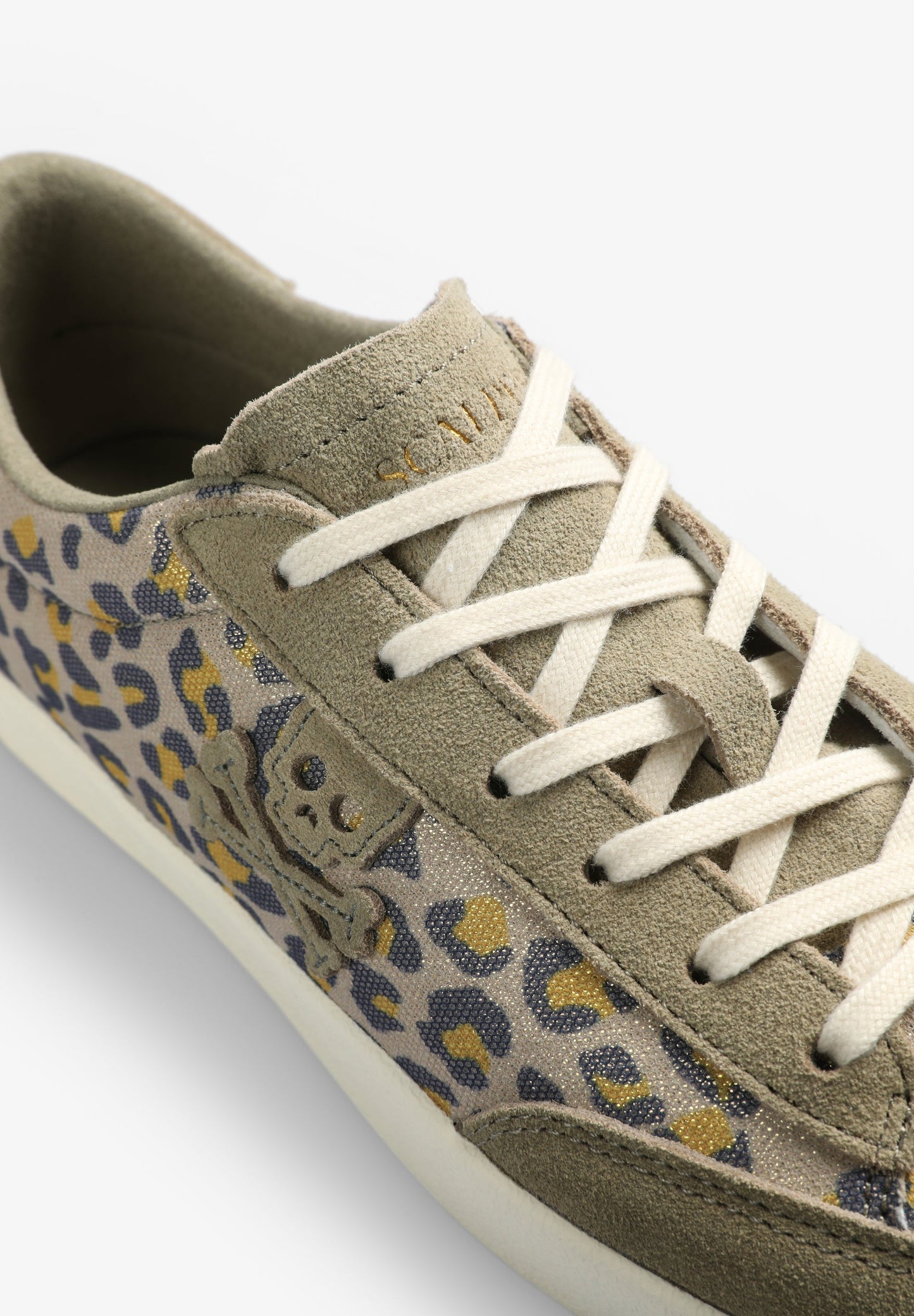 LOW TOP SNEAKERS WITH ANIMAL PRINT SKULL