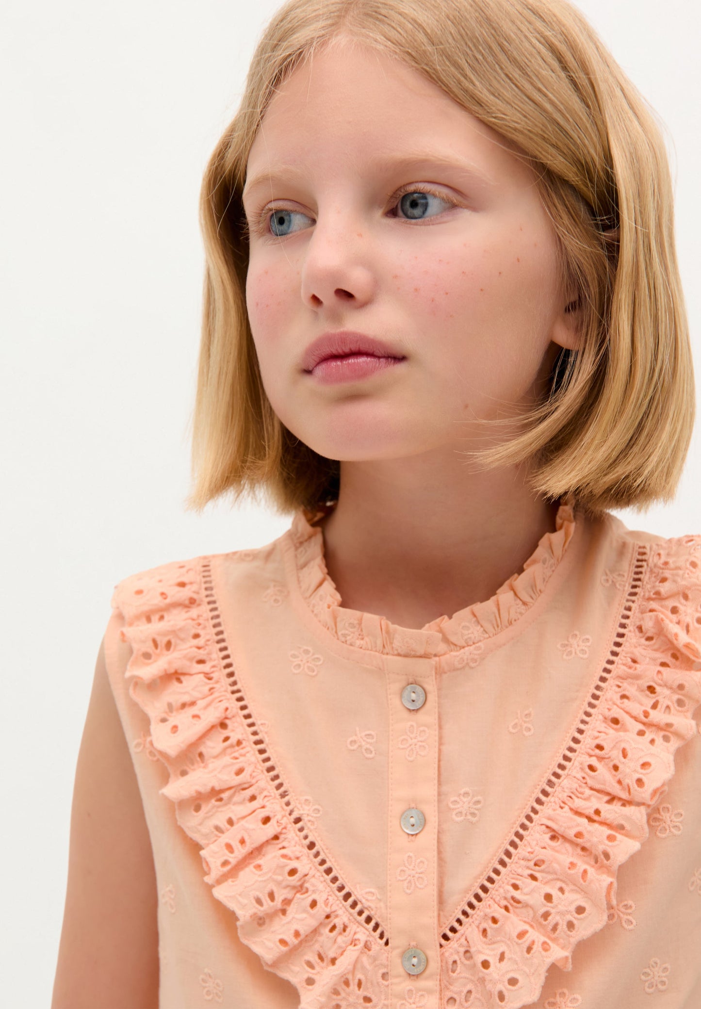 BLOUSE WITH EMBROIDERED RUFFLE DETAIL