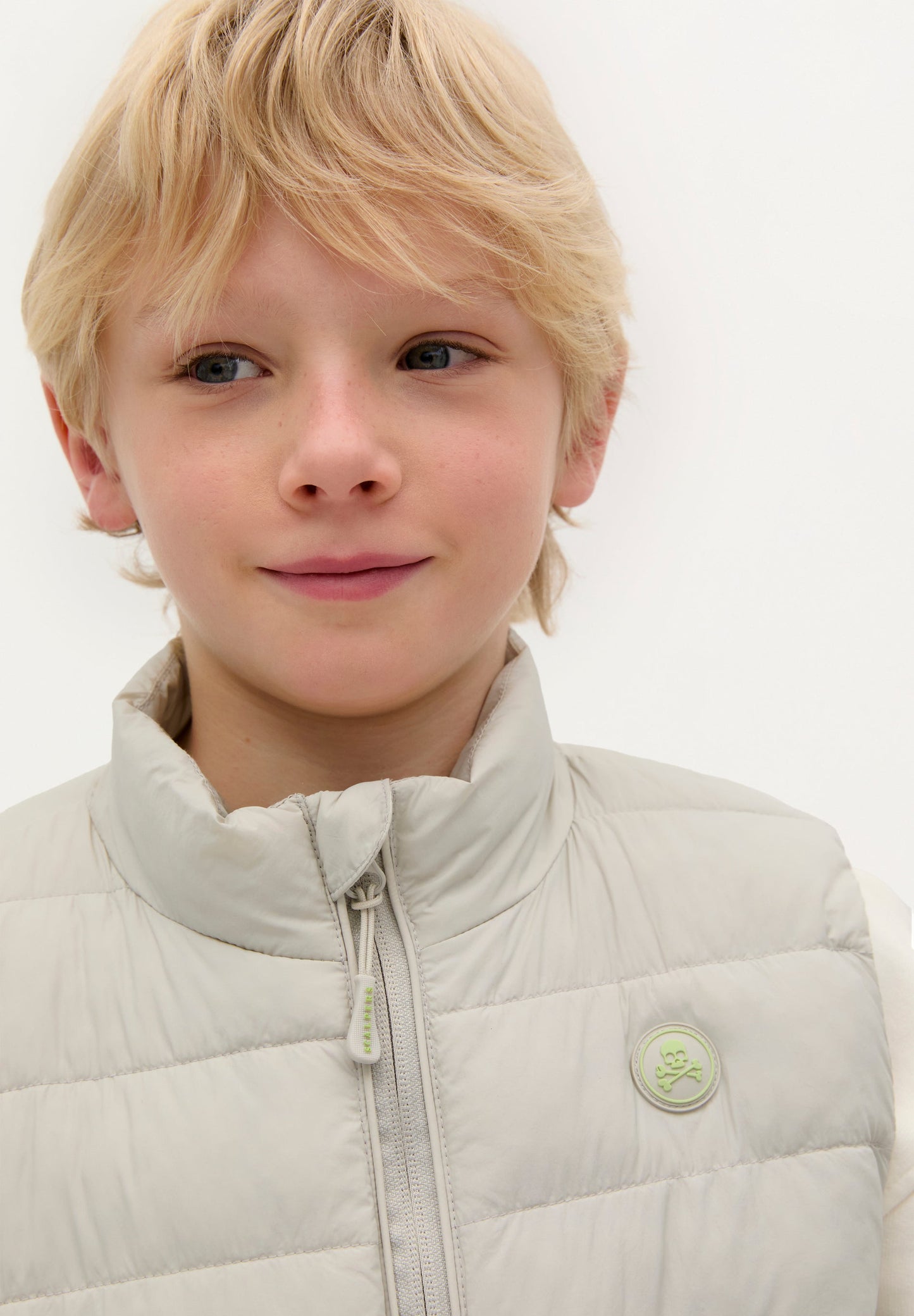 PUFFER VEST WITH SKULL