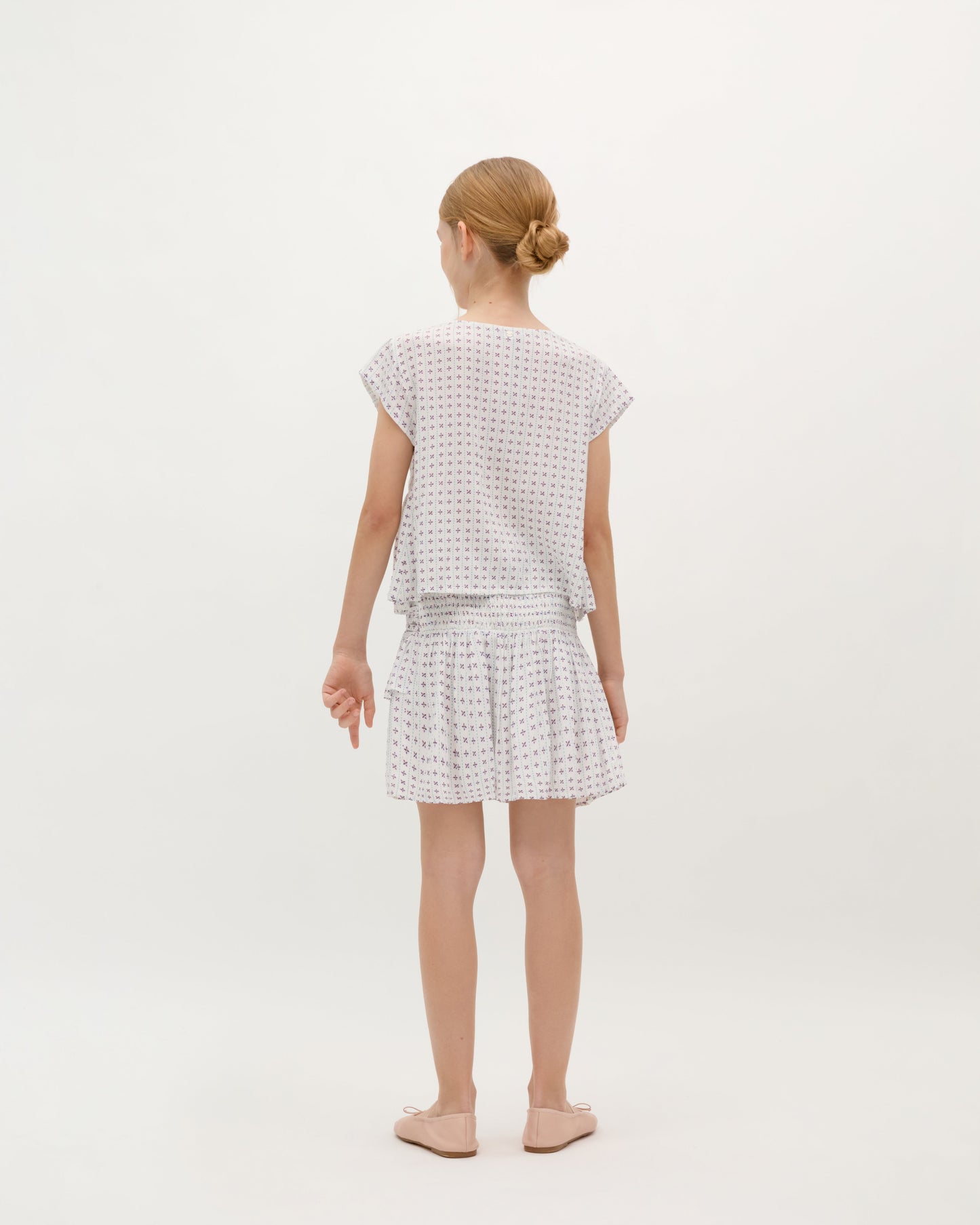 SMOCKED ASYMMETRIC SKIRT