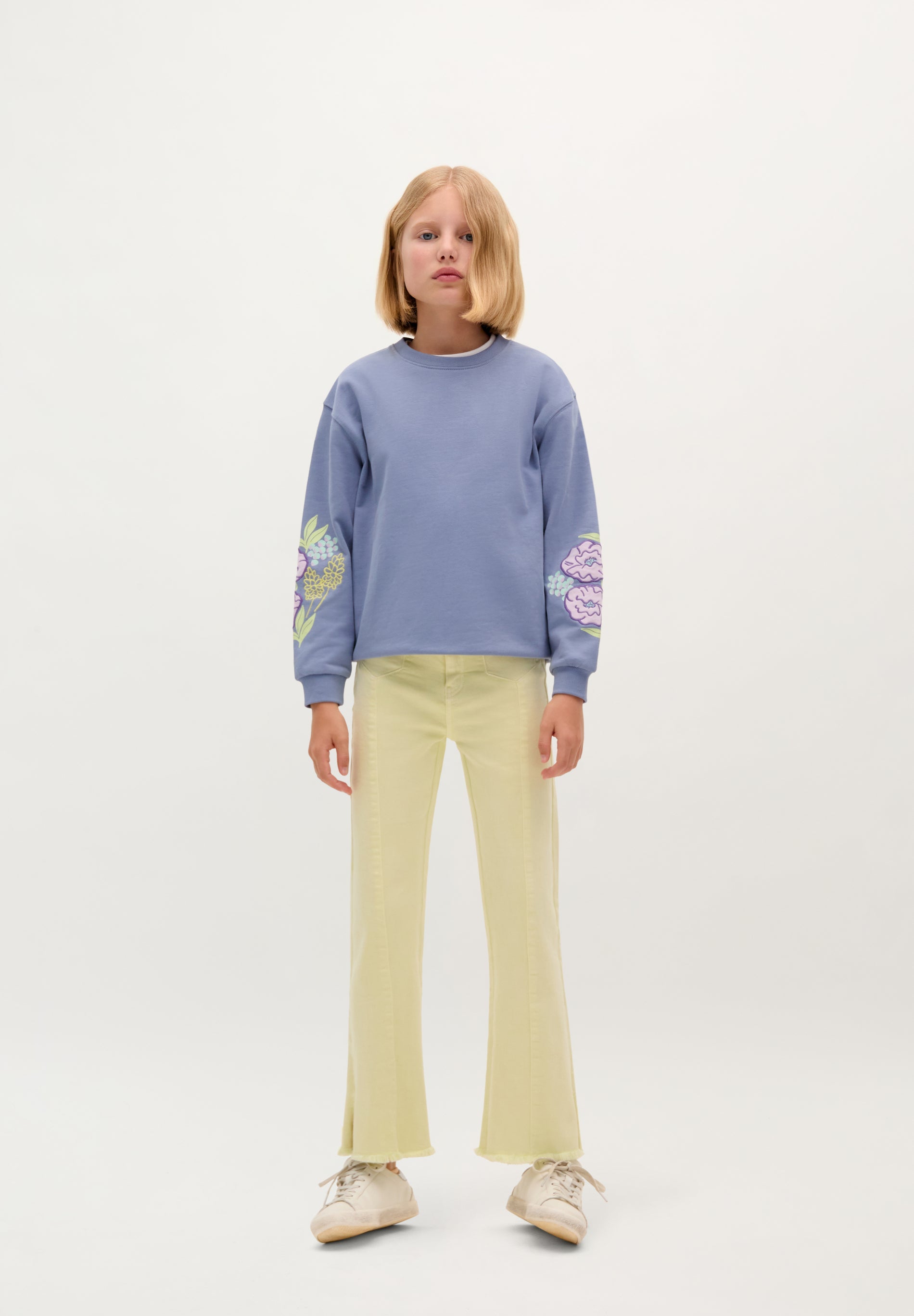 FLARED TROUSERS WITH BUTTONS