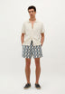 SWIMMING TRUNKS WITH ASYMMETRIC MOTIFS