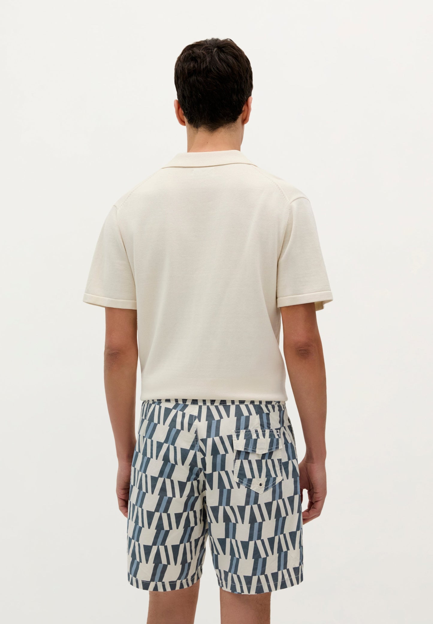 SWIMMING TRUNKS WITH ASYMMETRIC MOTIFS