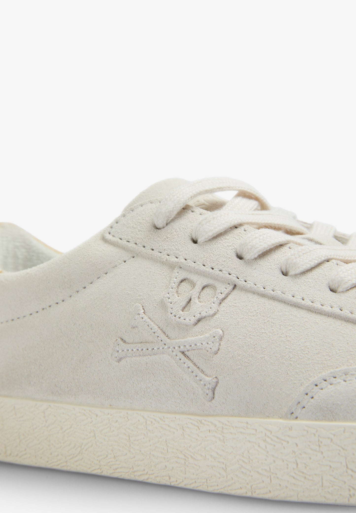 LOW TOP SNEAKERS WITH SIDE SKULL