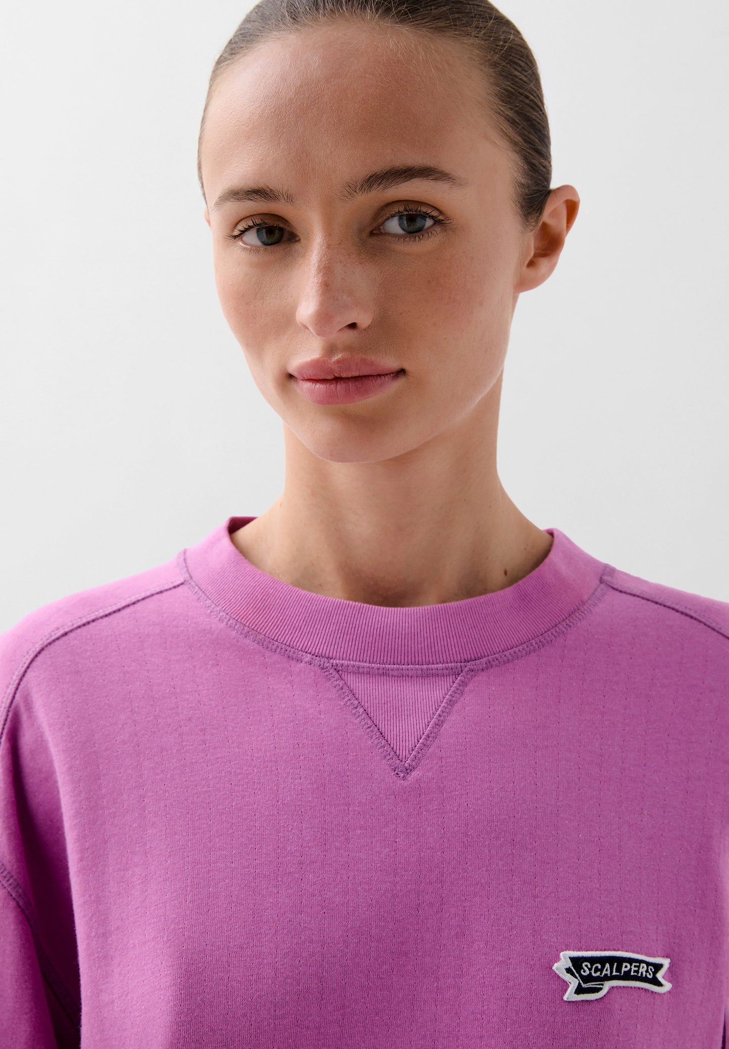SWEATSHIRT WITH LOGO PATCH