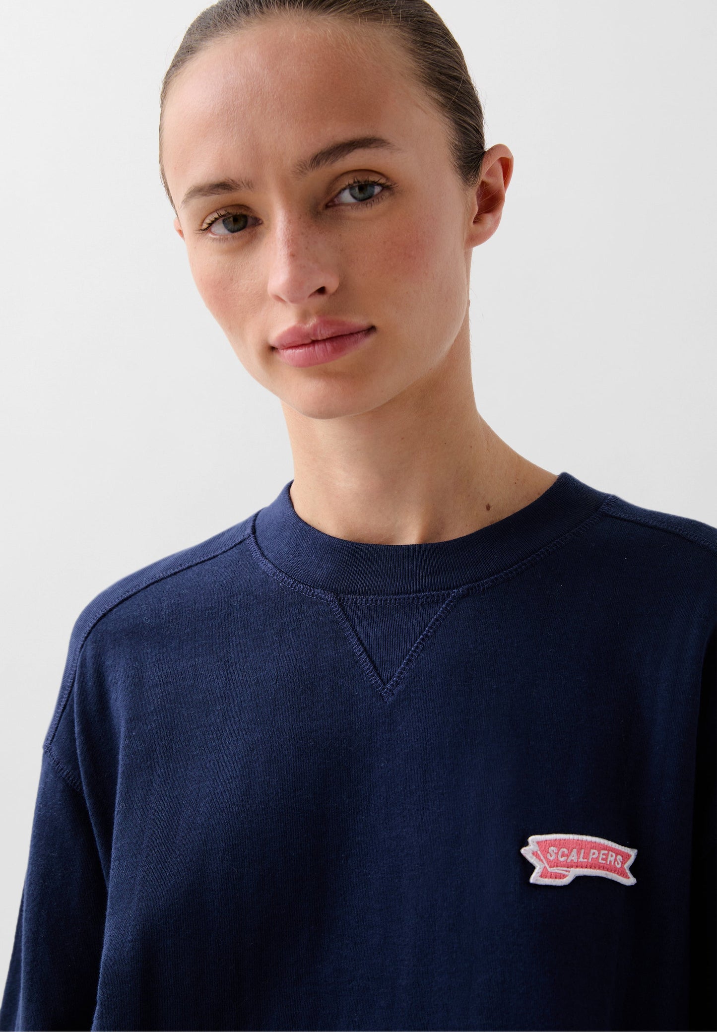 SWEATSHIRT WITH LOGO PATCH