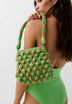 RAFFIA BAG WITH NEON DETAILS