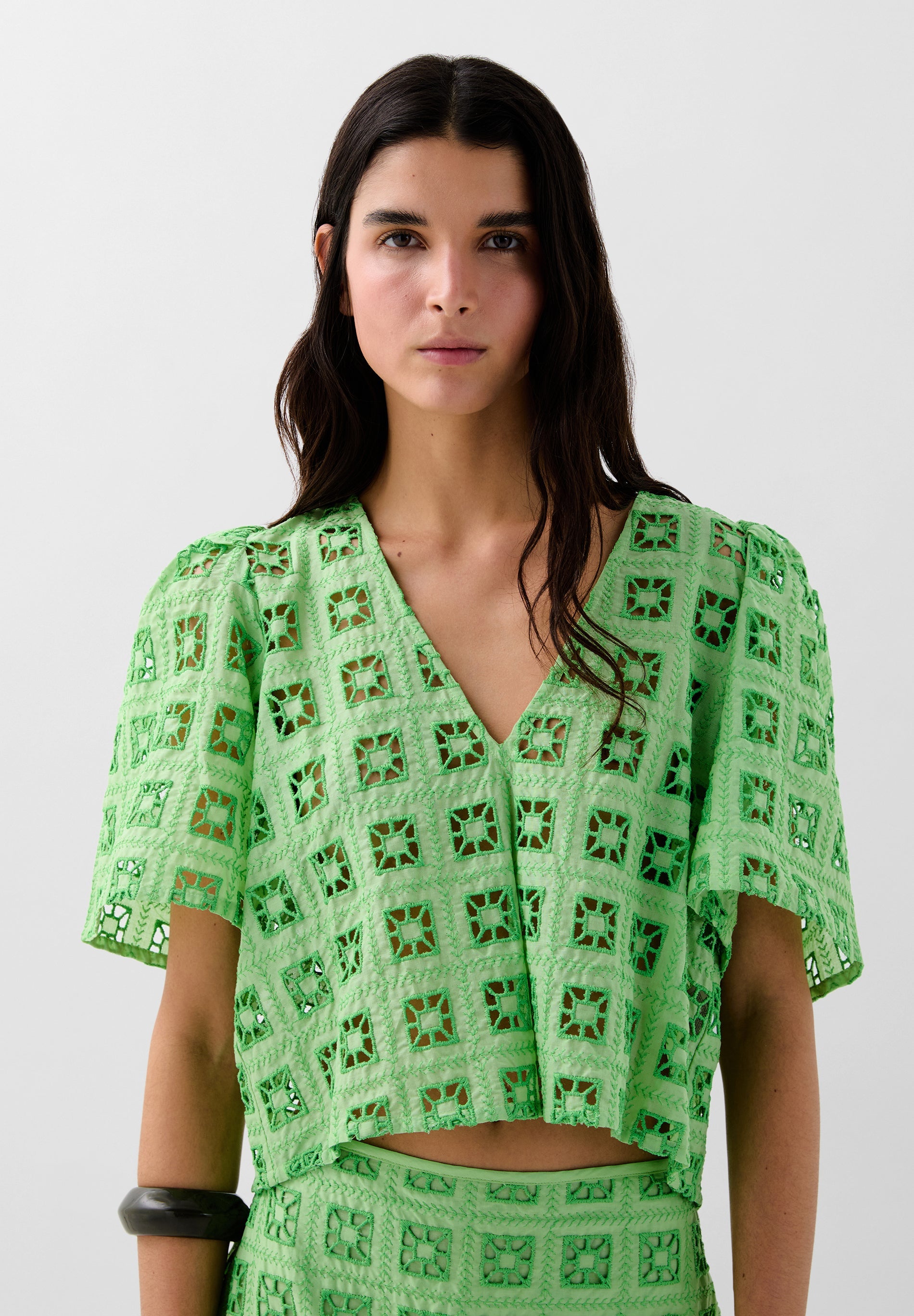 TOP WITH EMBROIDERED DETAILS