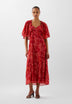 FLOWING PRINTED DRESS WITH CAPE