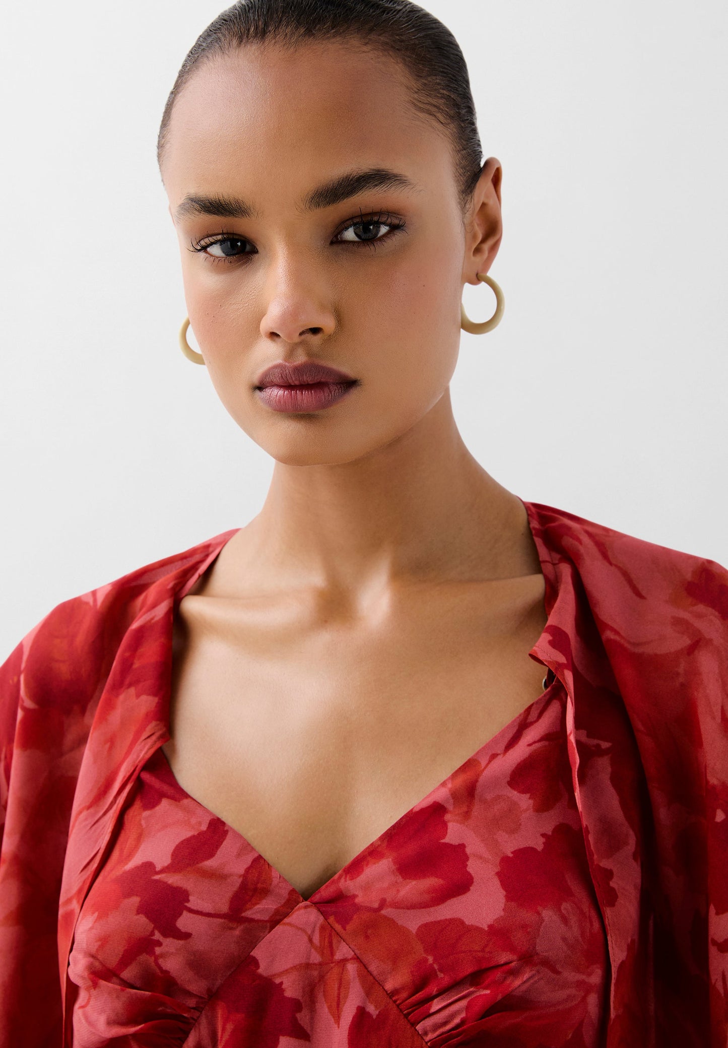 FLOWING PRINTED DRESS WITH CAPE