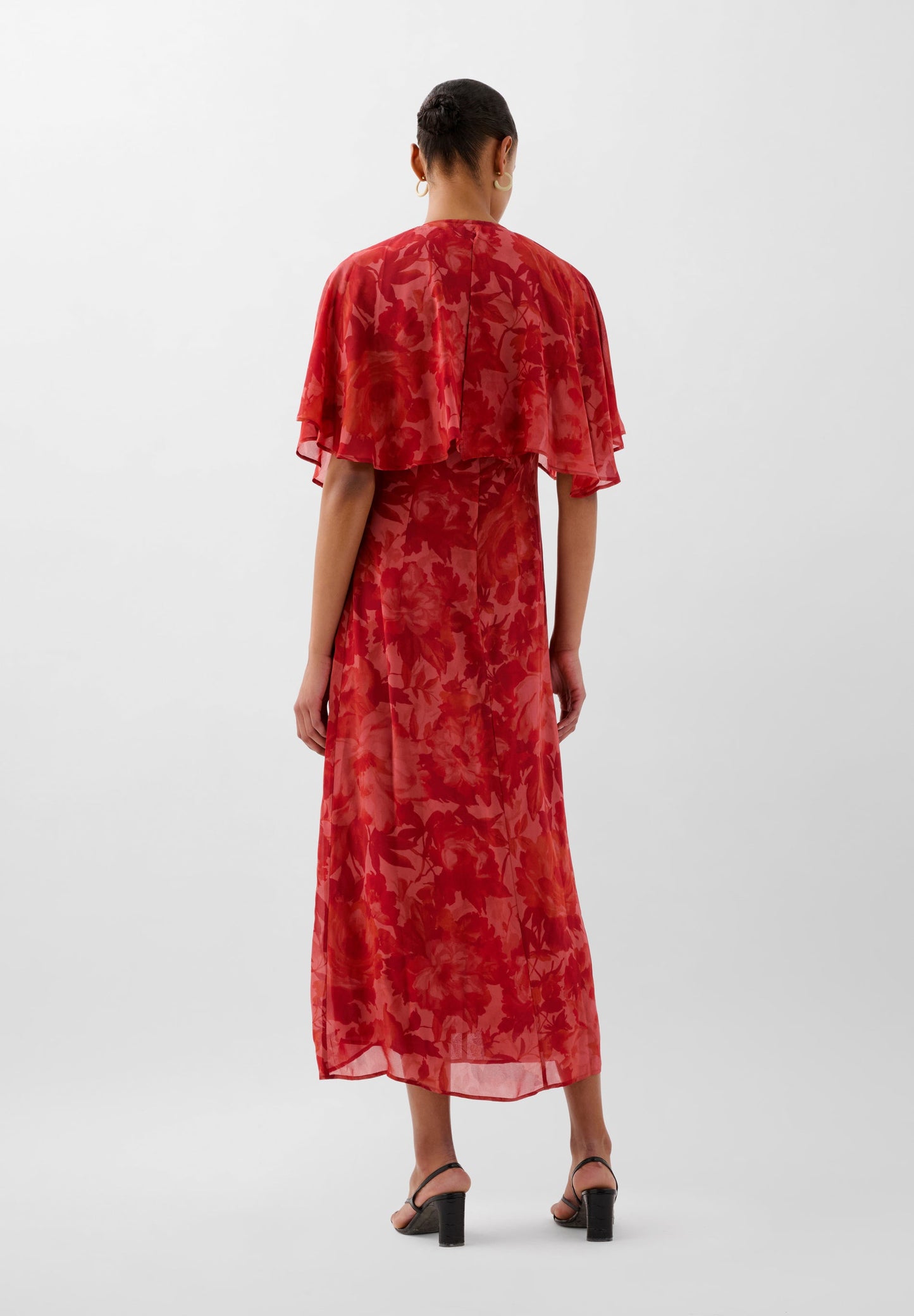 FLOWING PRINTED DRESS WITH CAPE
