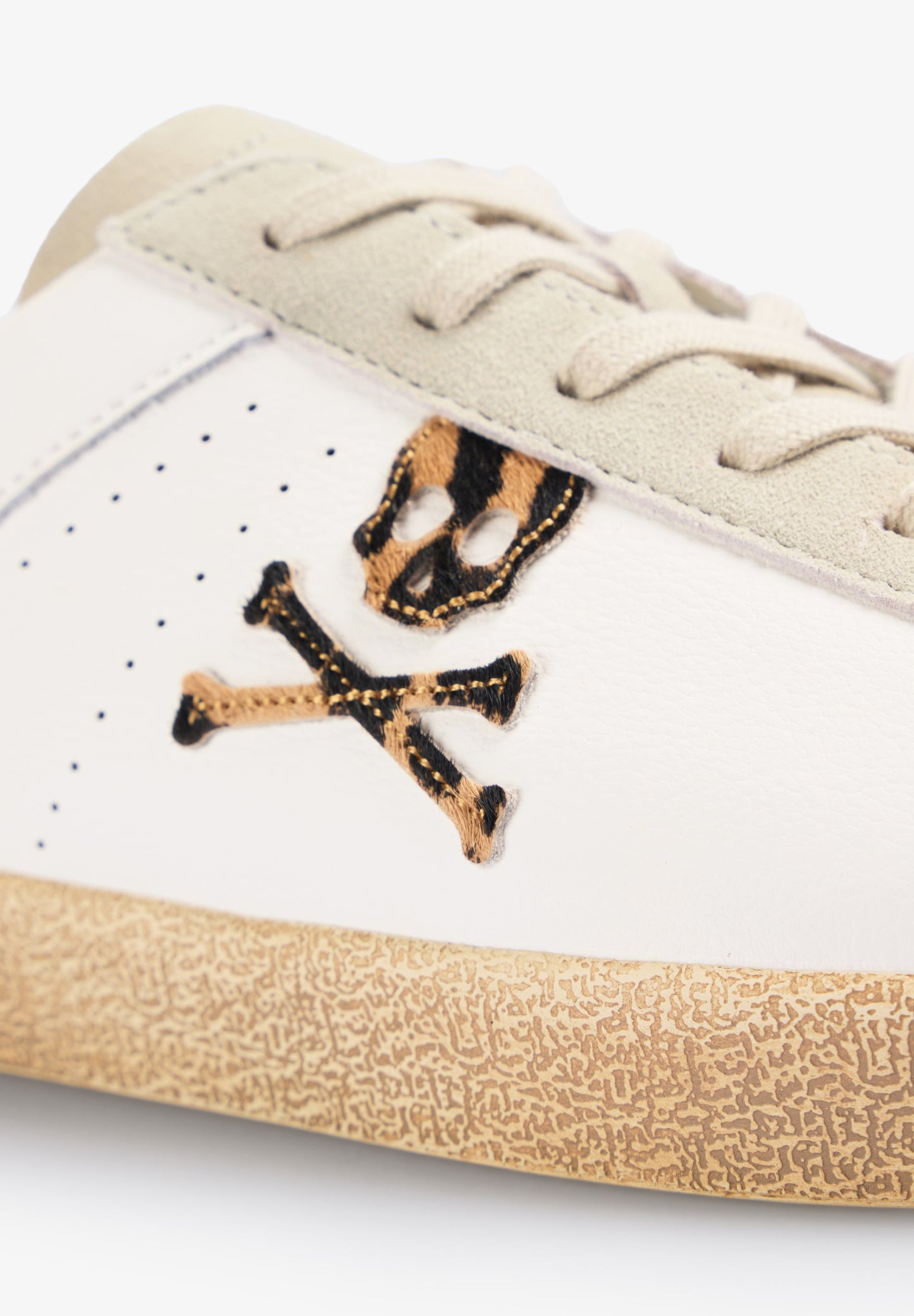 LOW TOP SNEAKERS WITH ANIMAL PRINT SKULL