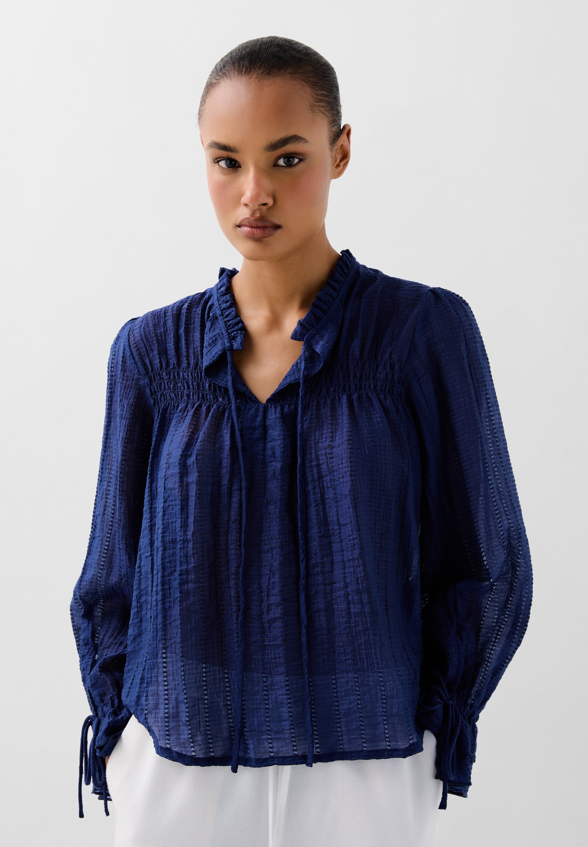 FLOWING BLOUSE WITH DETAILS