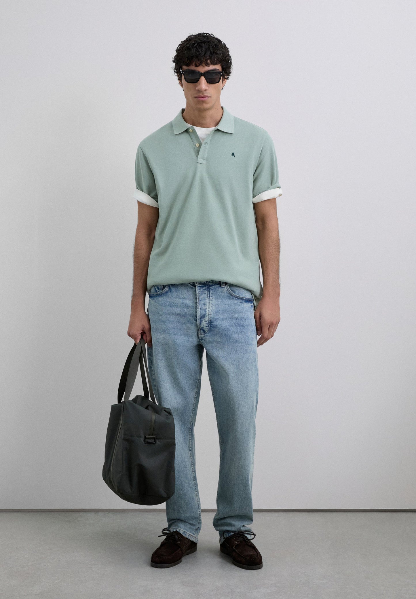 PIQUÉ POLO MET BORDUURSEL