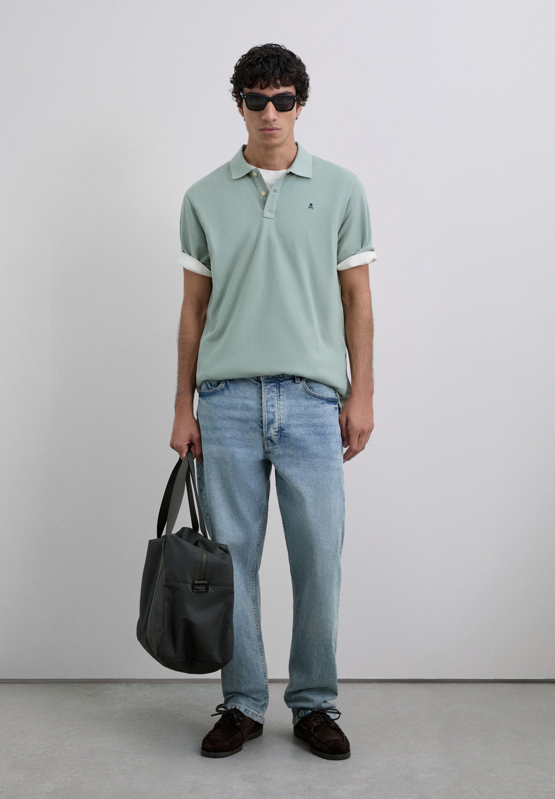 PIQUÉ POLO MET BORDUURSEL