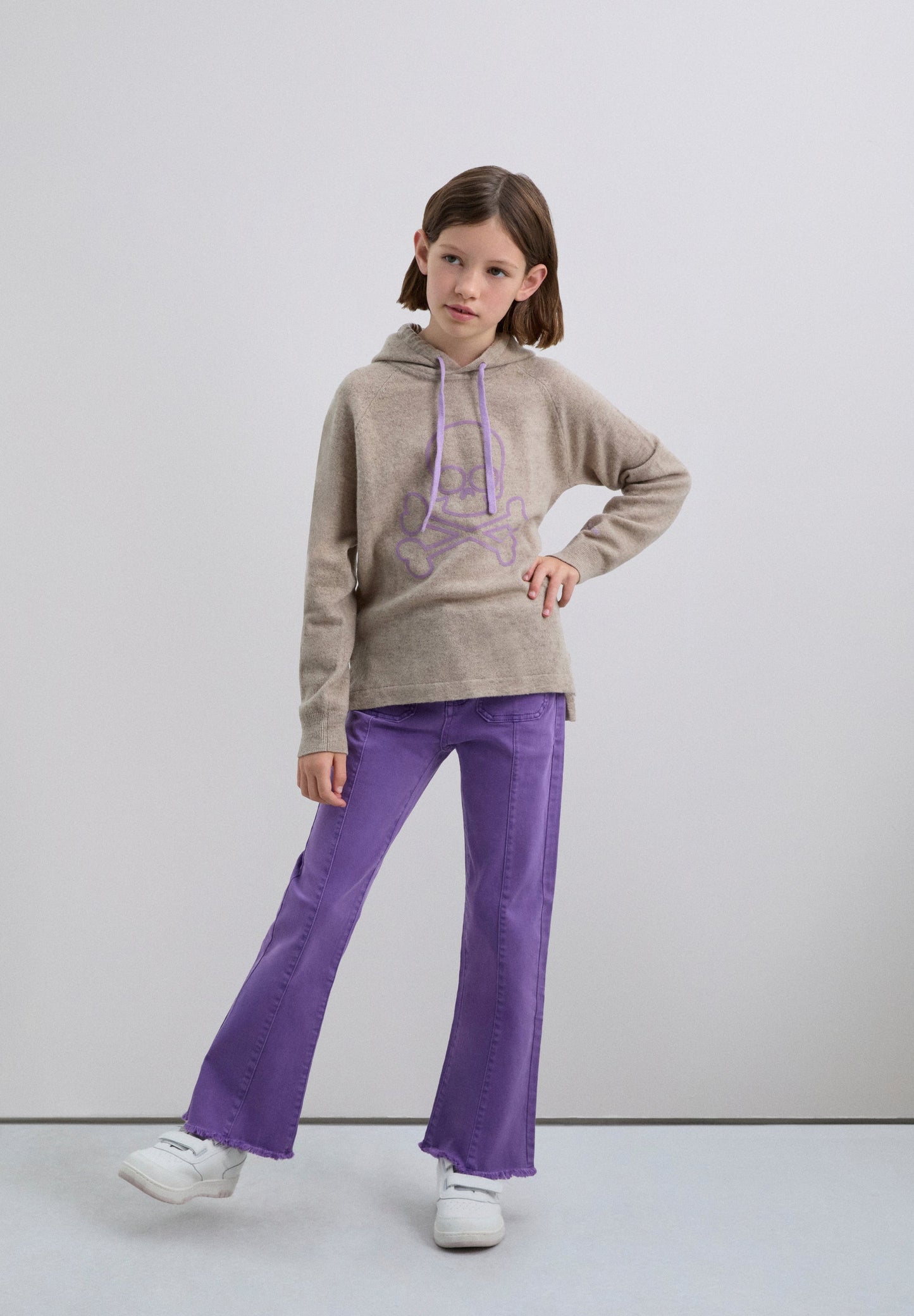 FLARED TROUSERS WITH FRINGING