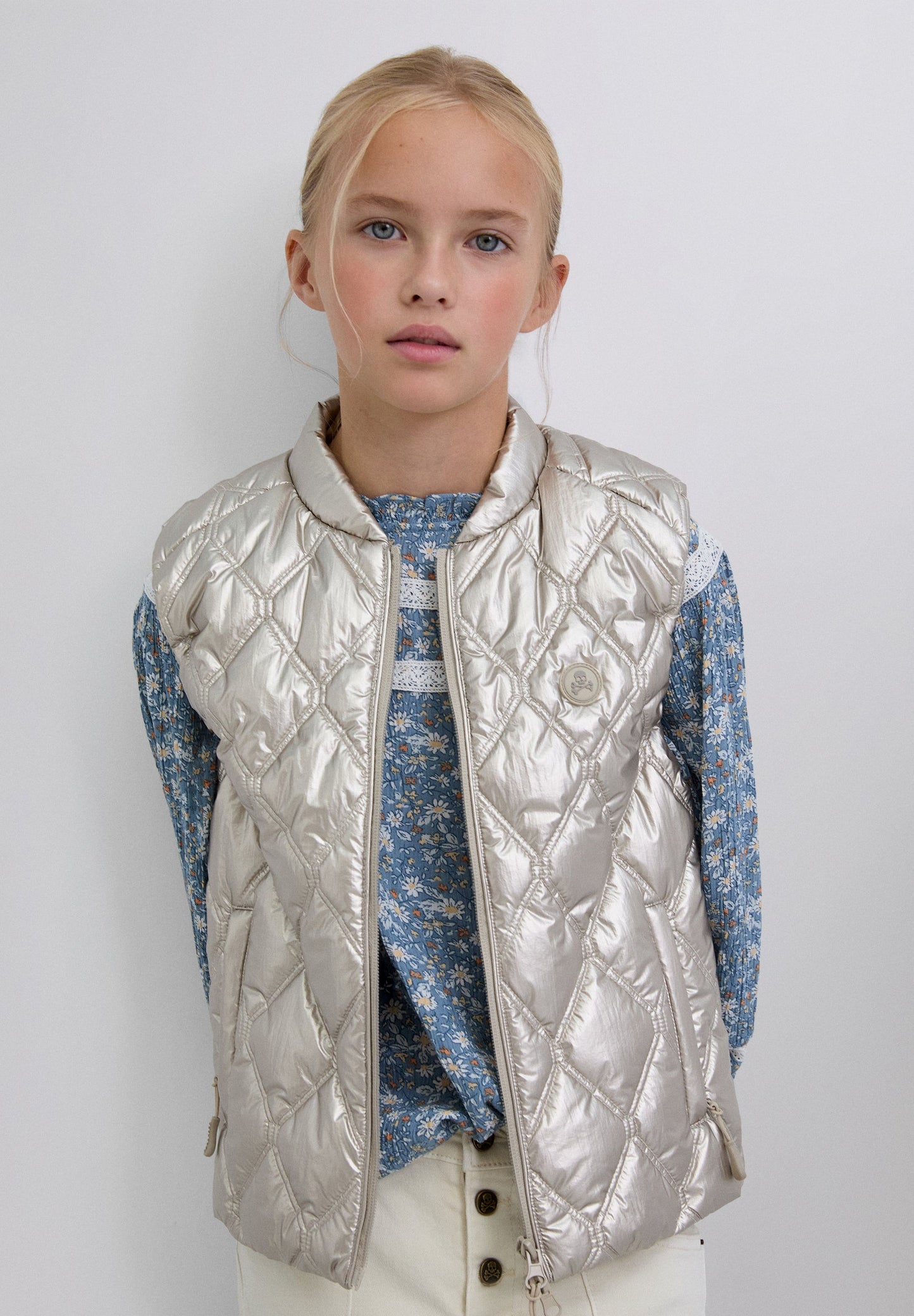 PUFFER VEST WITH SKULL