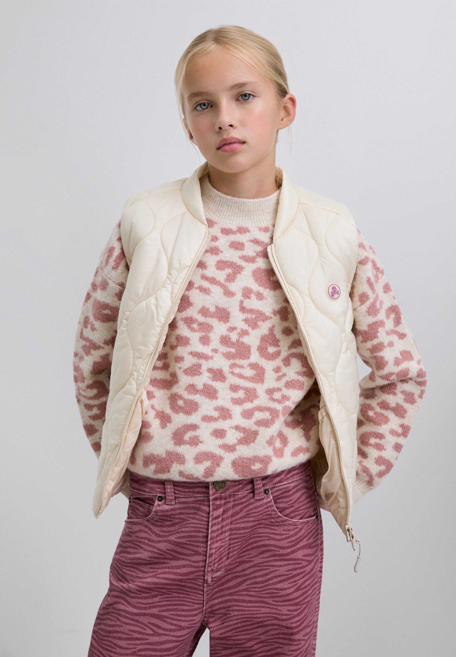 PUFFER VEST WITH SKULL