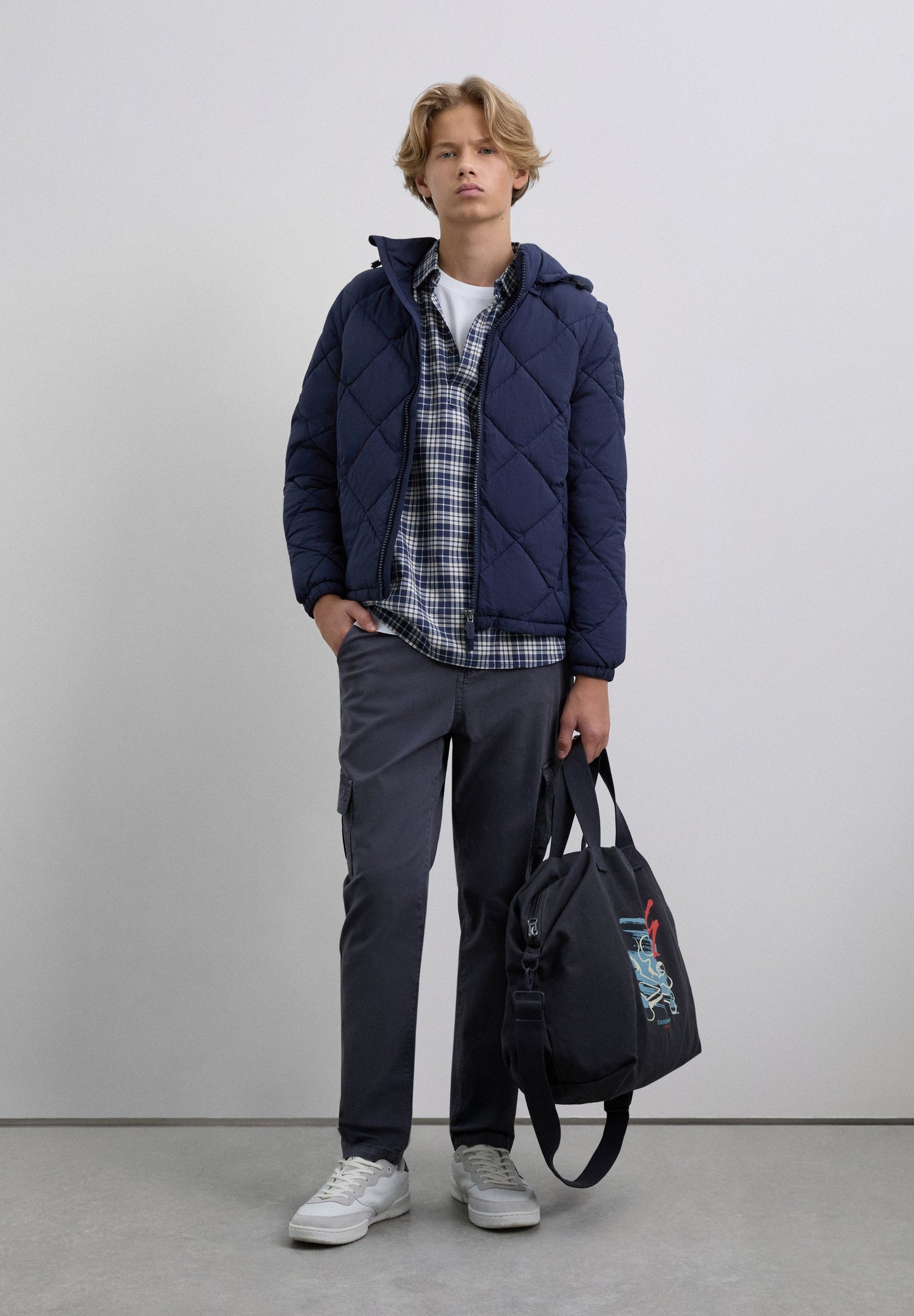 STEPPJACKE MIT ABNEHMBAREM DETAIL