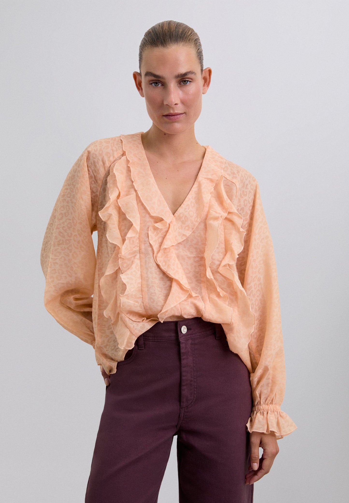 ANIMAL PRINT BLOUSE WITH RUFFLES