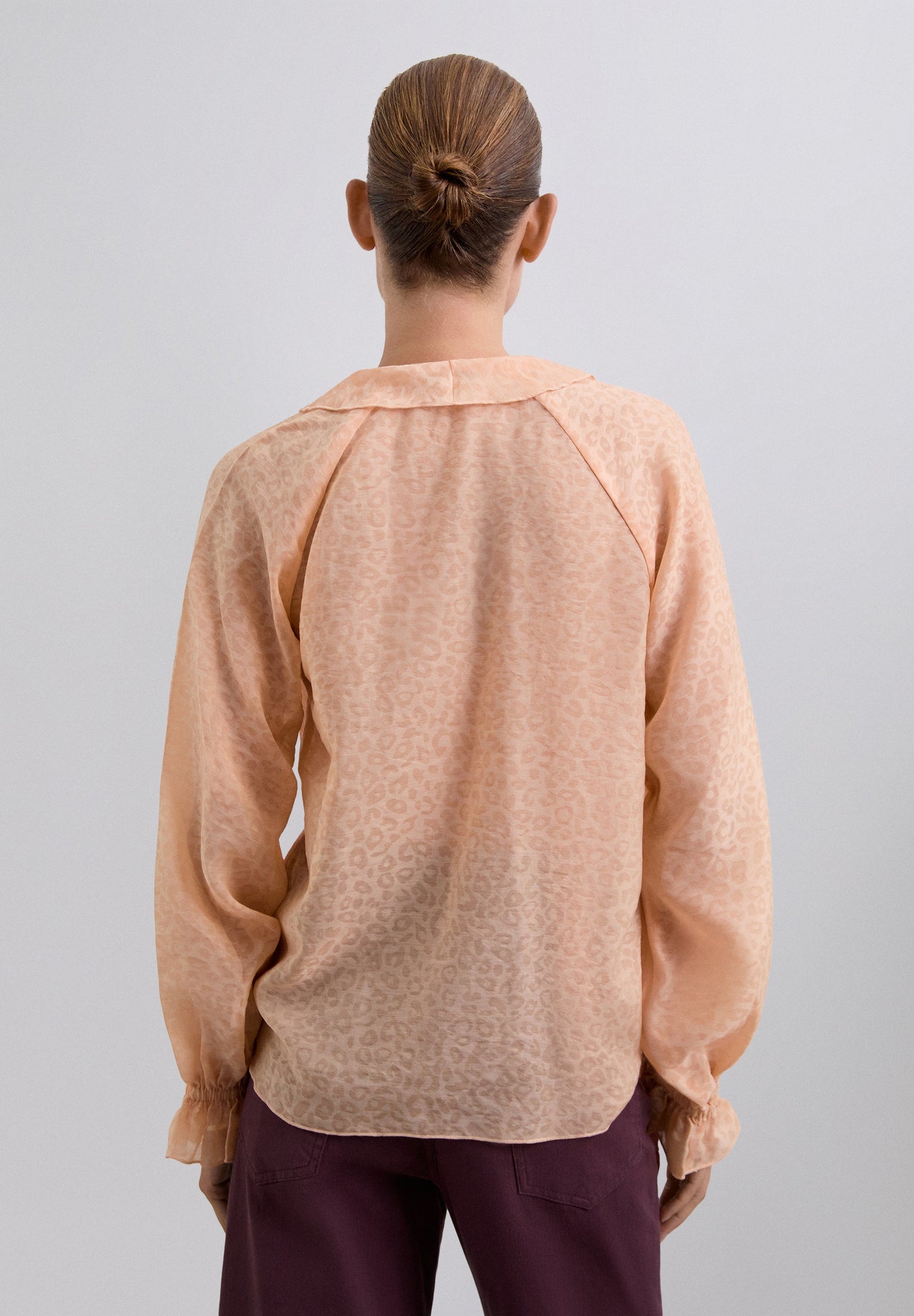 ANIMAL PRINT BLOUSE WITH RUFFLES