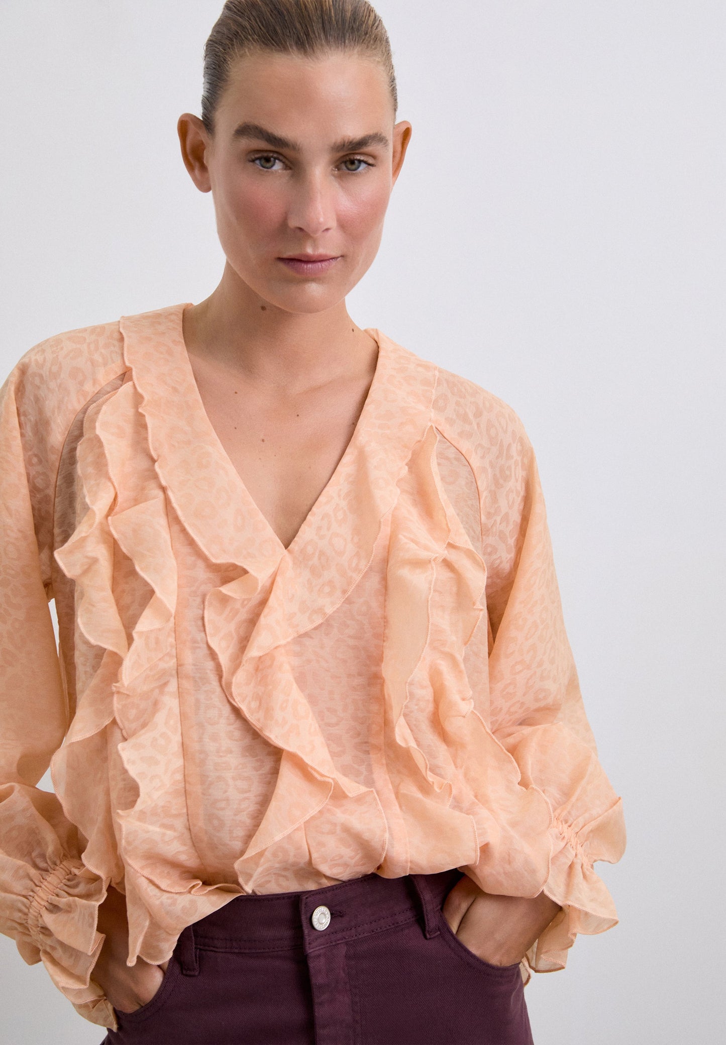 ANIMAL PRINT BLOUSE WITH RUFFLES