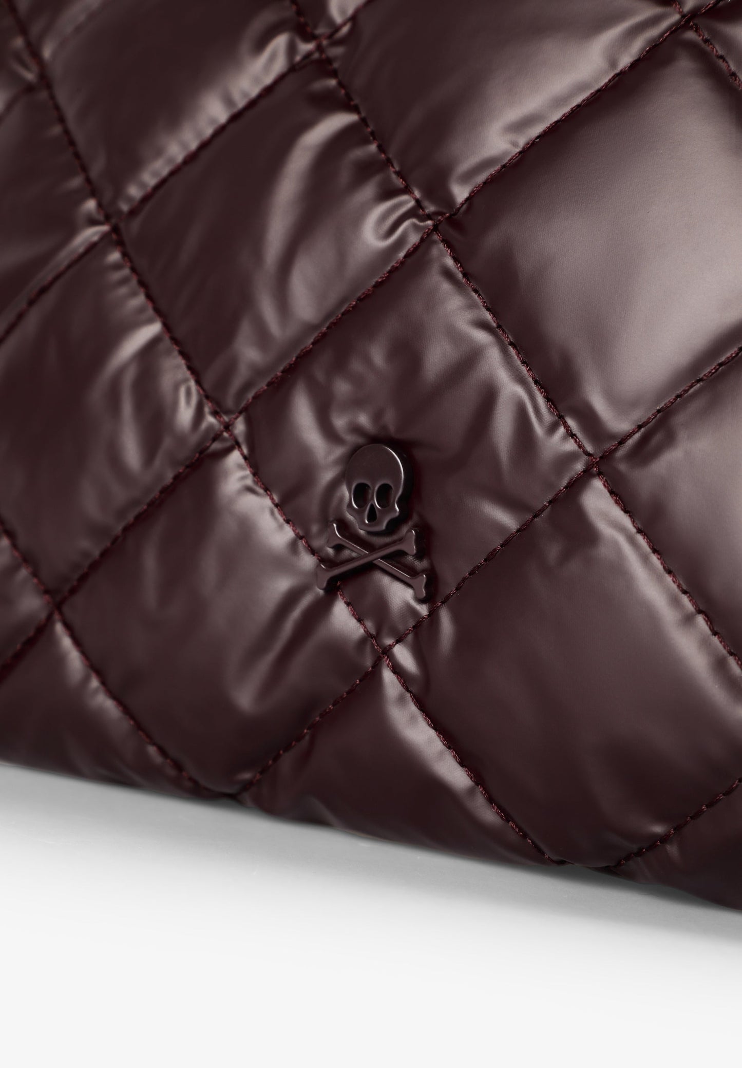 QUILTED SKULL TOTE BAG