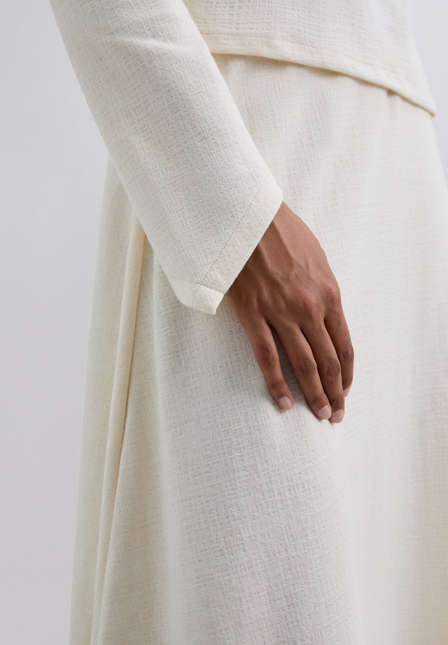 HALFLANGE ROK TRICOT ASYMMETRISCH