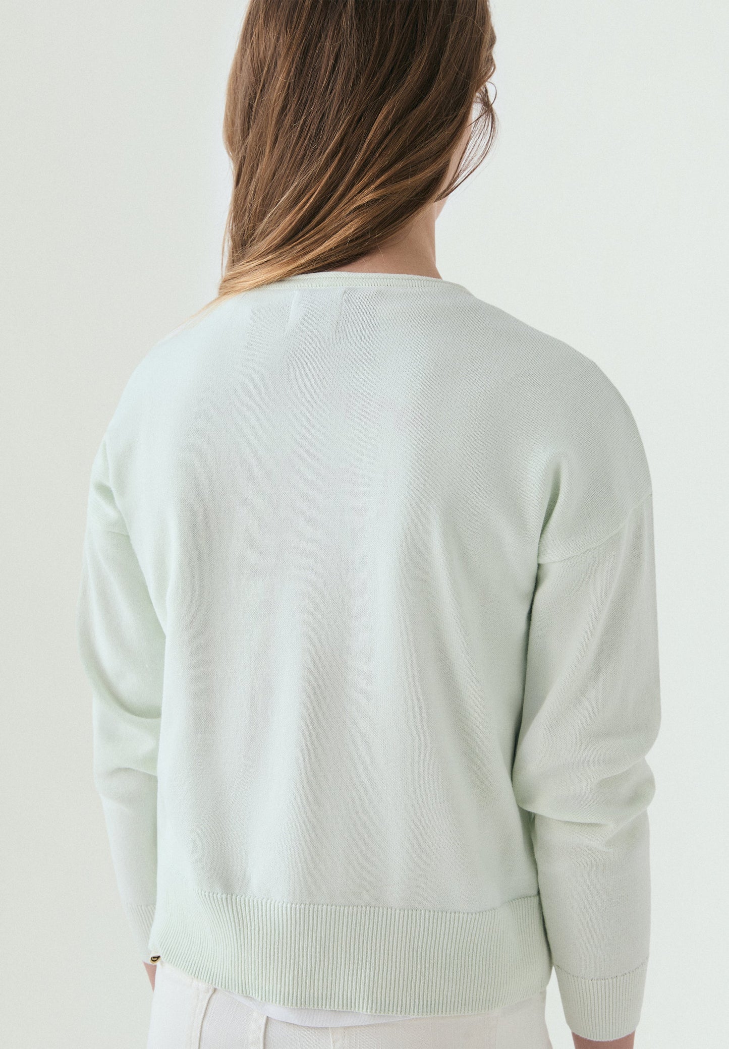 SWEATER WITH STUDDED SKULL