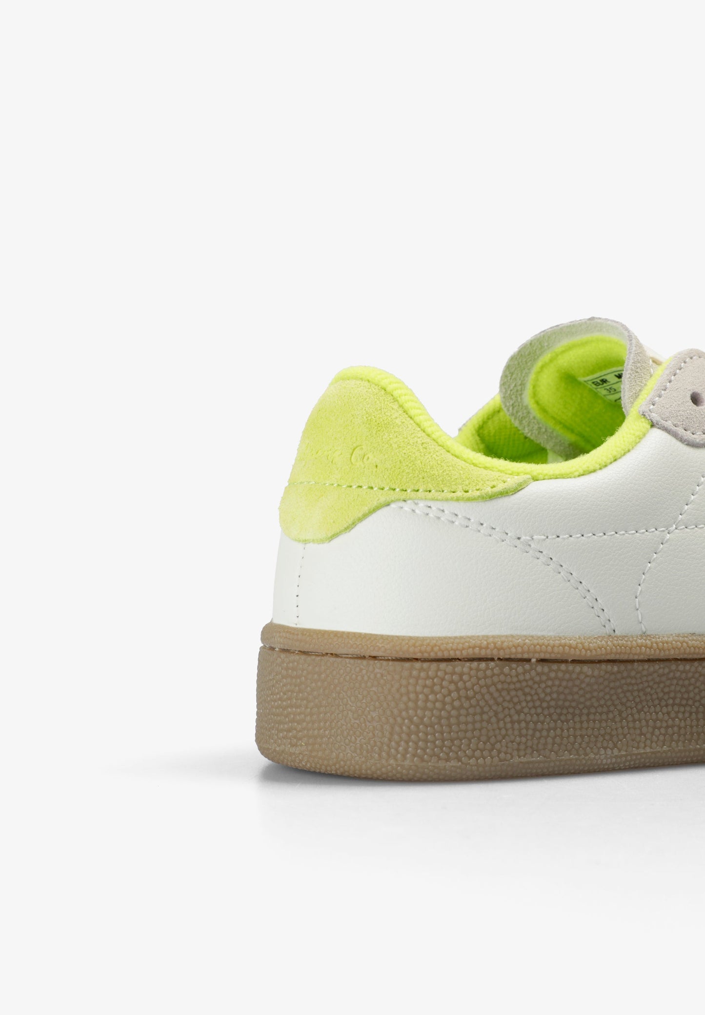 SNEAKERS WITH NEON SKULL DETAIL