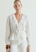 BLUSE MIT RAFFUNG UND VOLANT