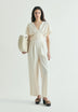 JUMPSUIT MIT STREIFEN UND ÜBERKREUZTEM BUND