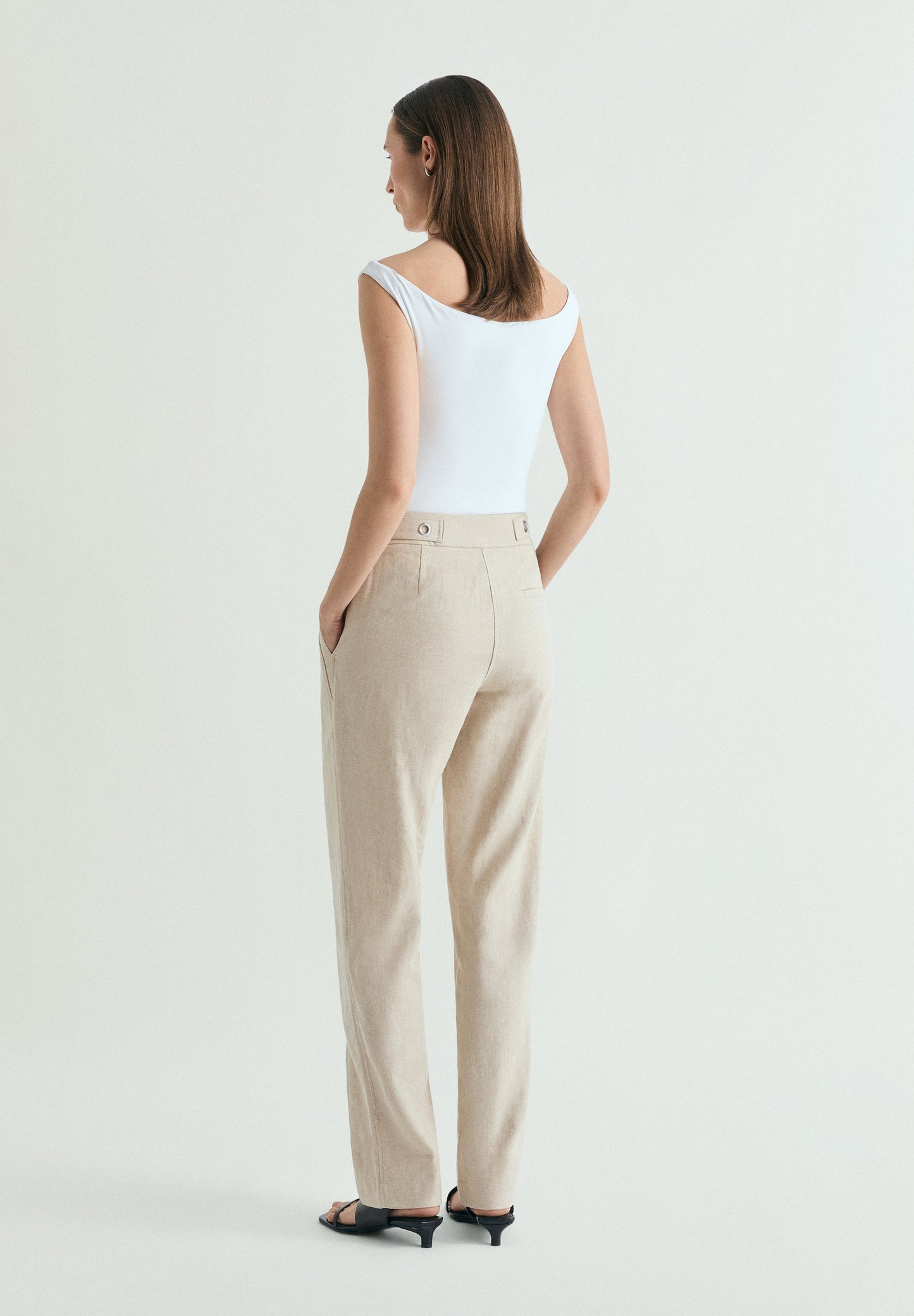 LINEN TROUSERS WITH METAL DETAILS