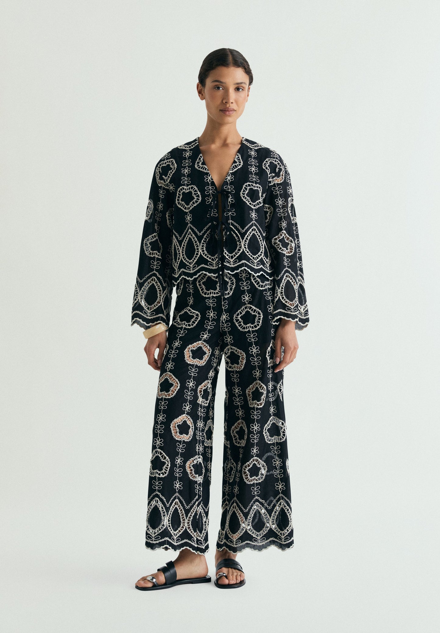 TROUSERS WITH CONTRAST EMBROIDERY