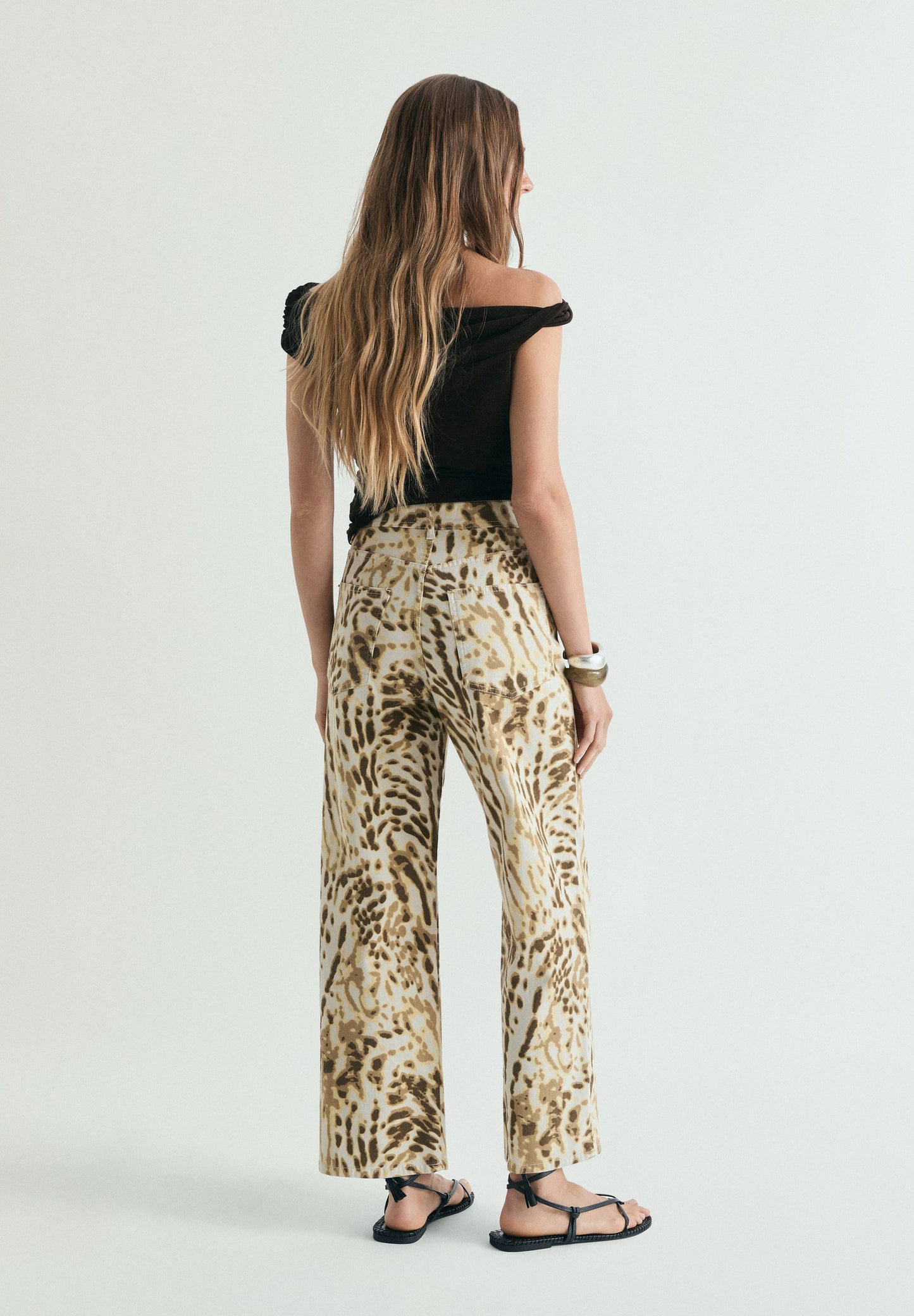 PANTALONI DENIM STAMPA ANIMALIER