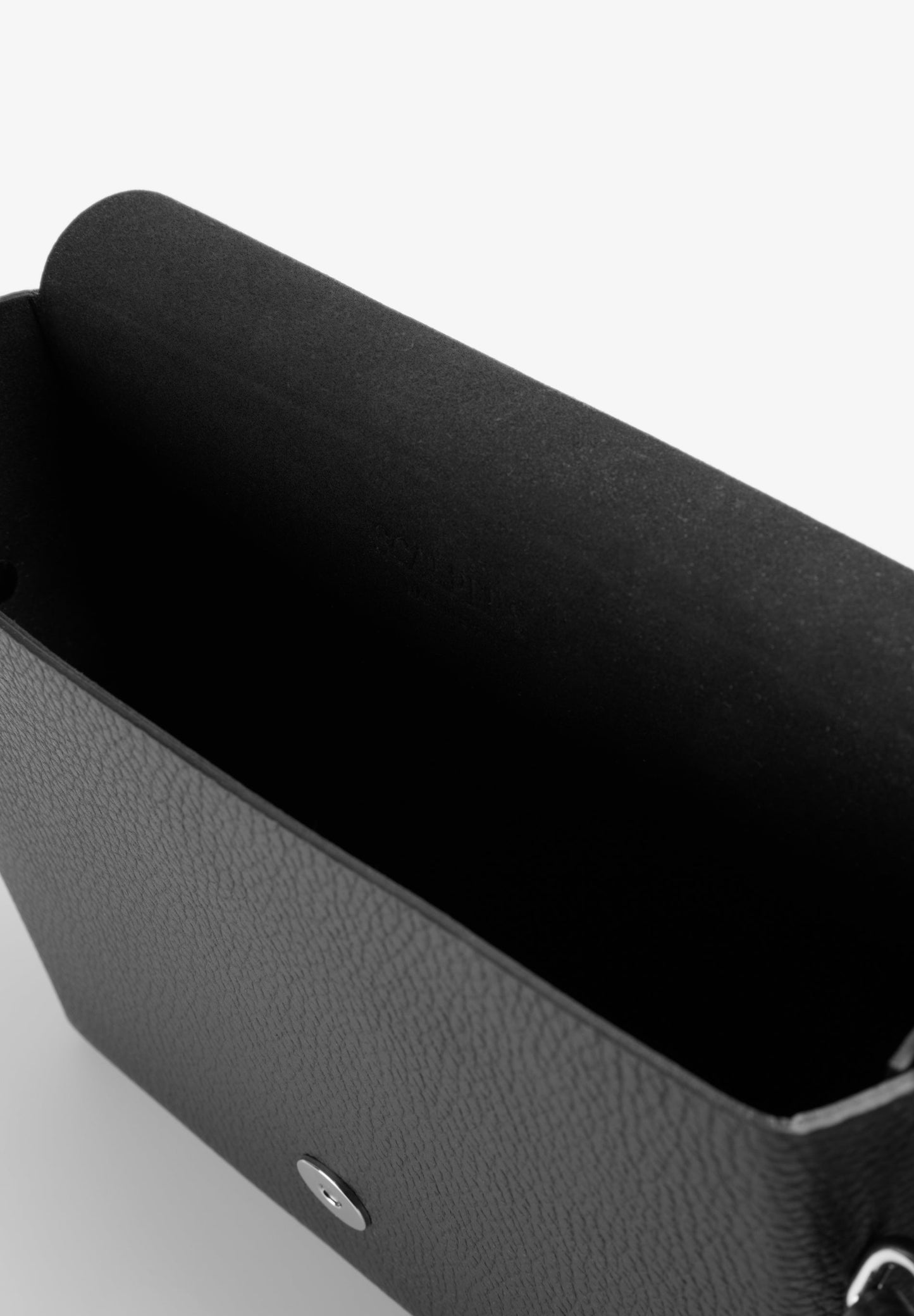 LEATHER BAG WITH APPLIQUÉS