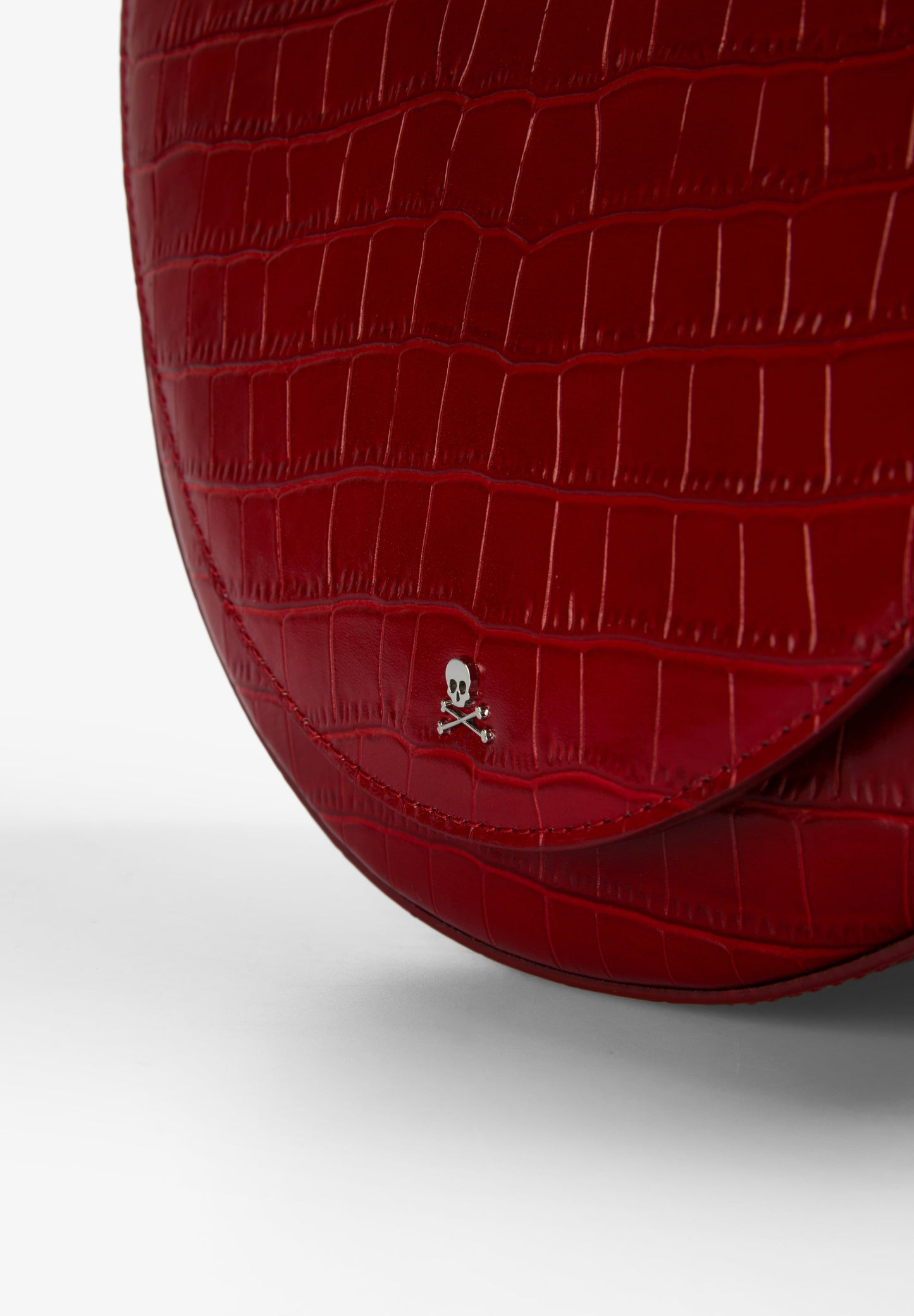 EMBOSSED LEATHER CROSSBODY BAG