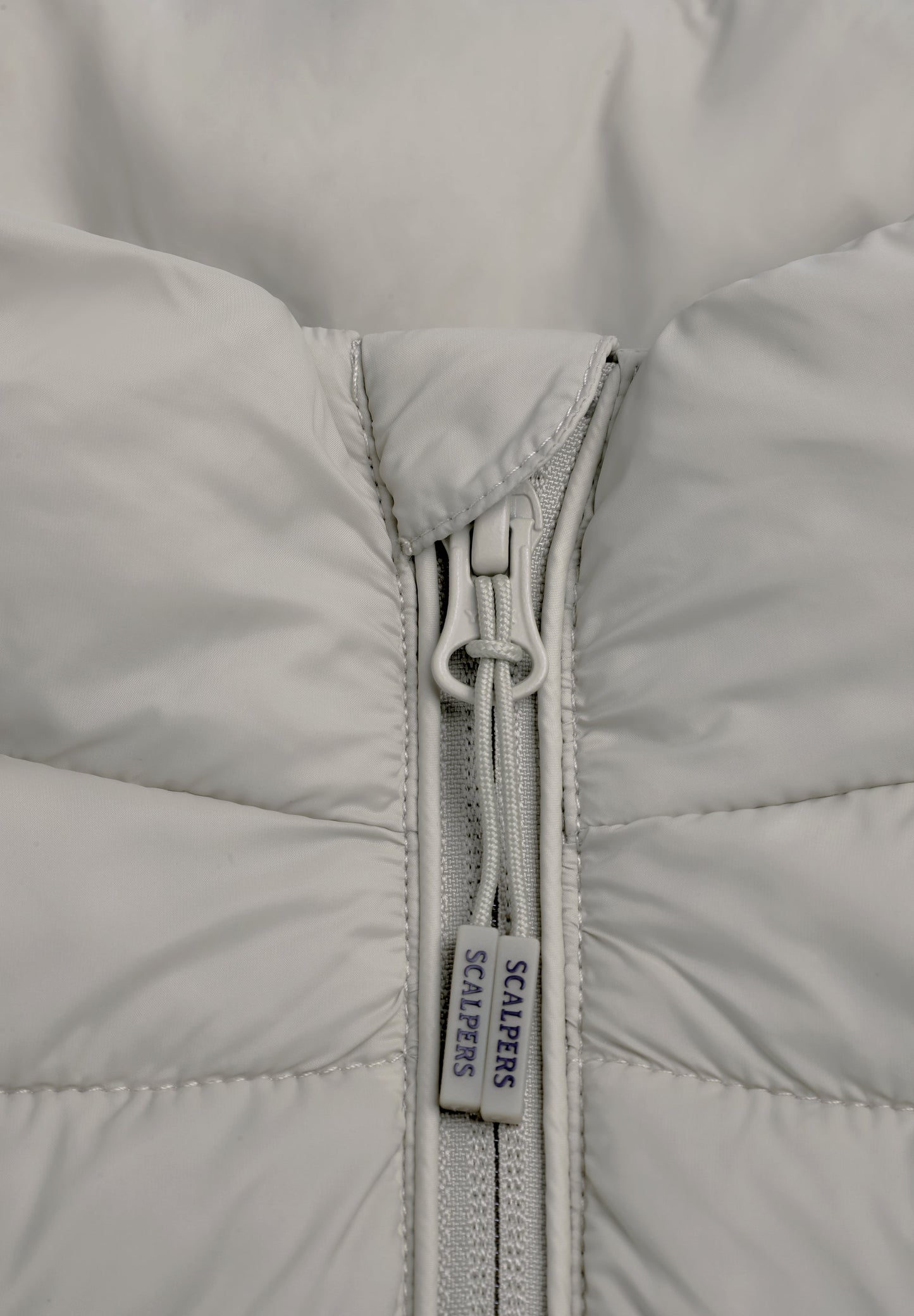 PUFFER JACKET WITH SKULL DETAIL