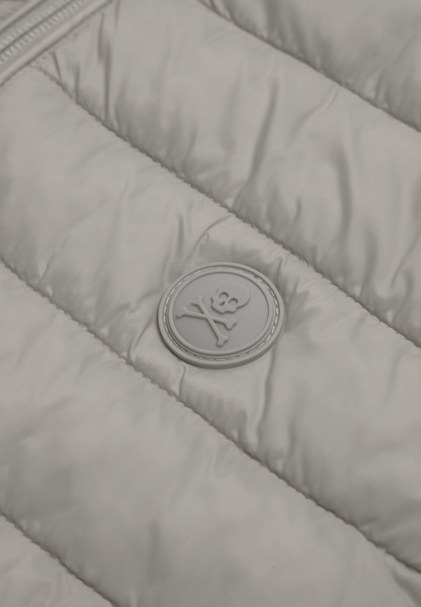 PUFFER JACKET WITH SKULL DETAIL