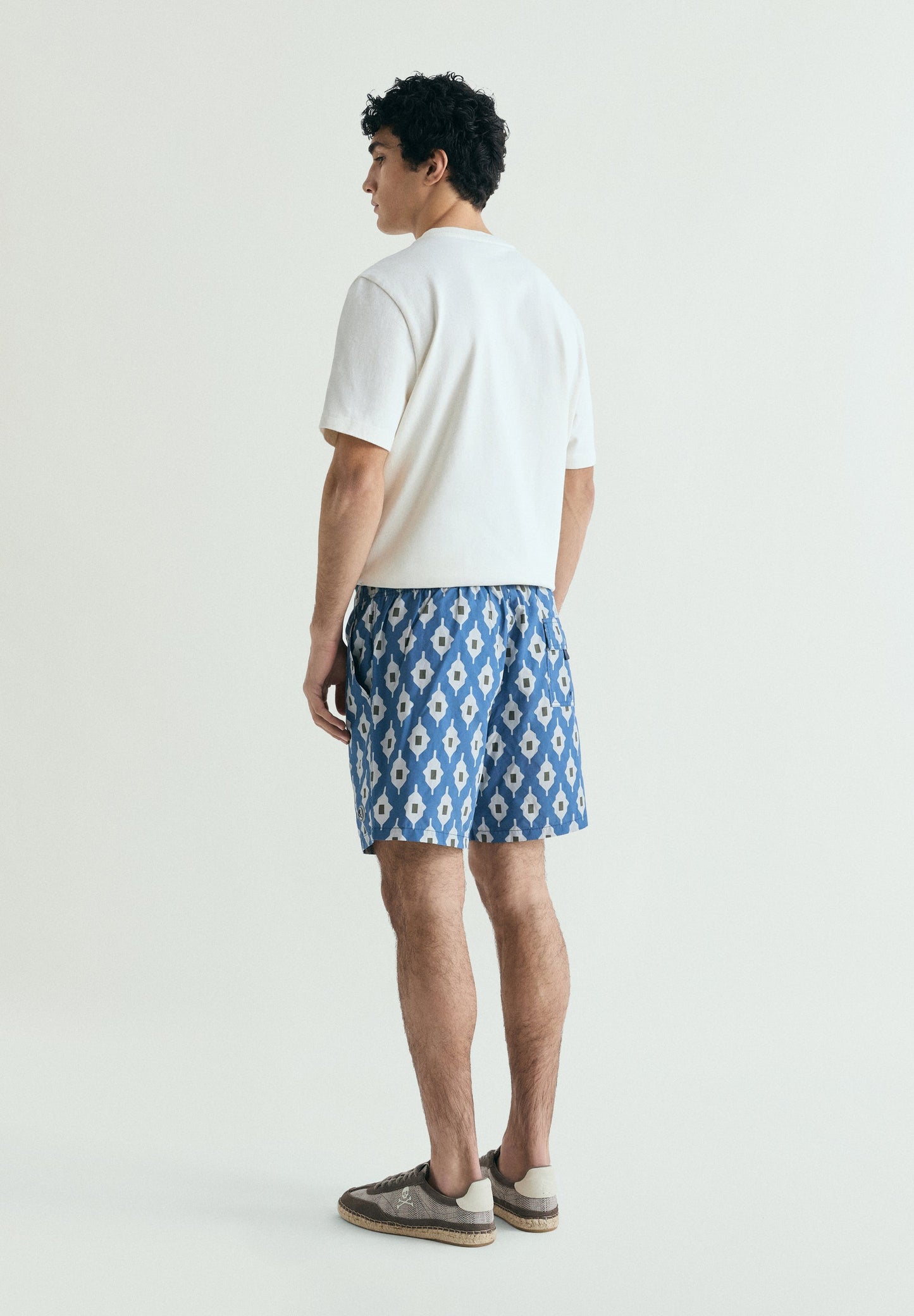 GEOMETRIC PRINT SWIMMING TRUNKS